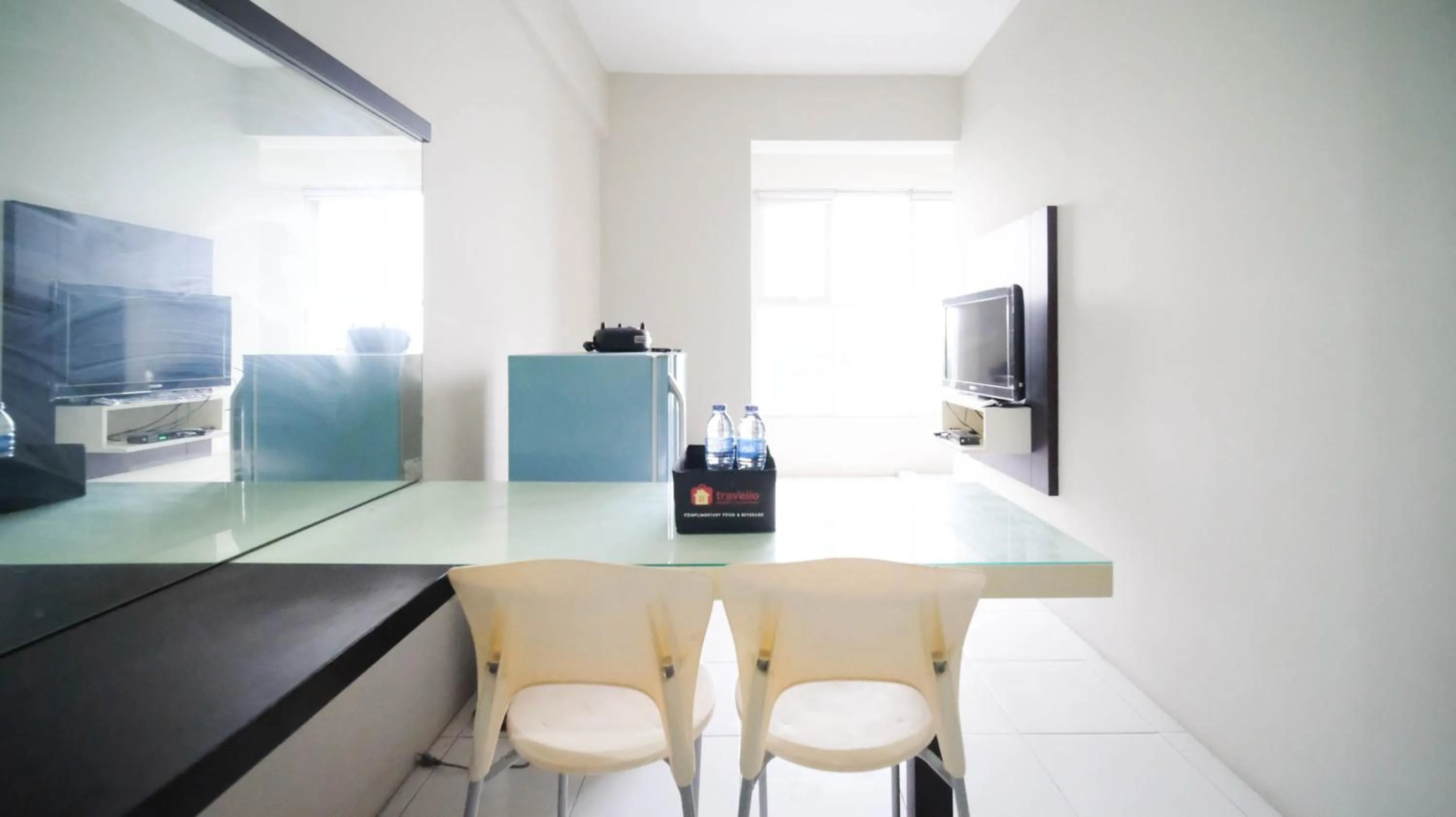 Homey and Comfy 2BR at Dian Regency Apartment By Travelio
