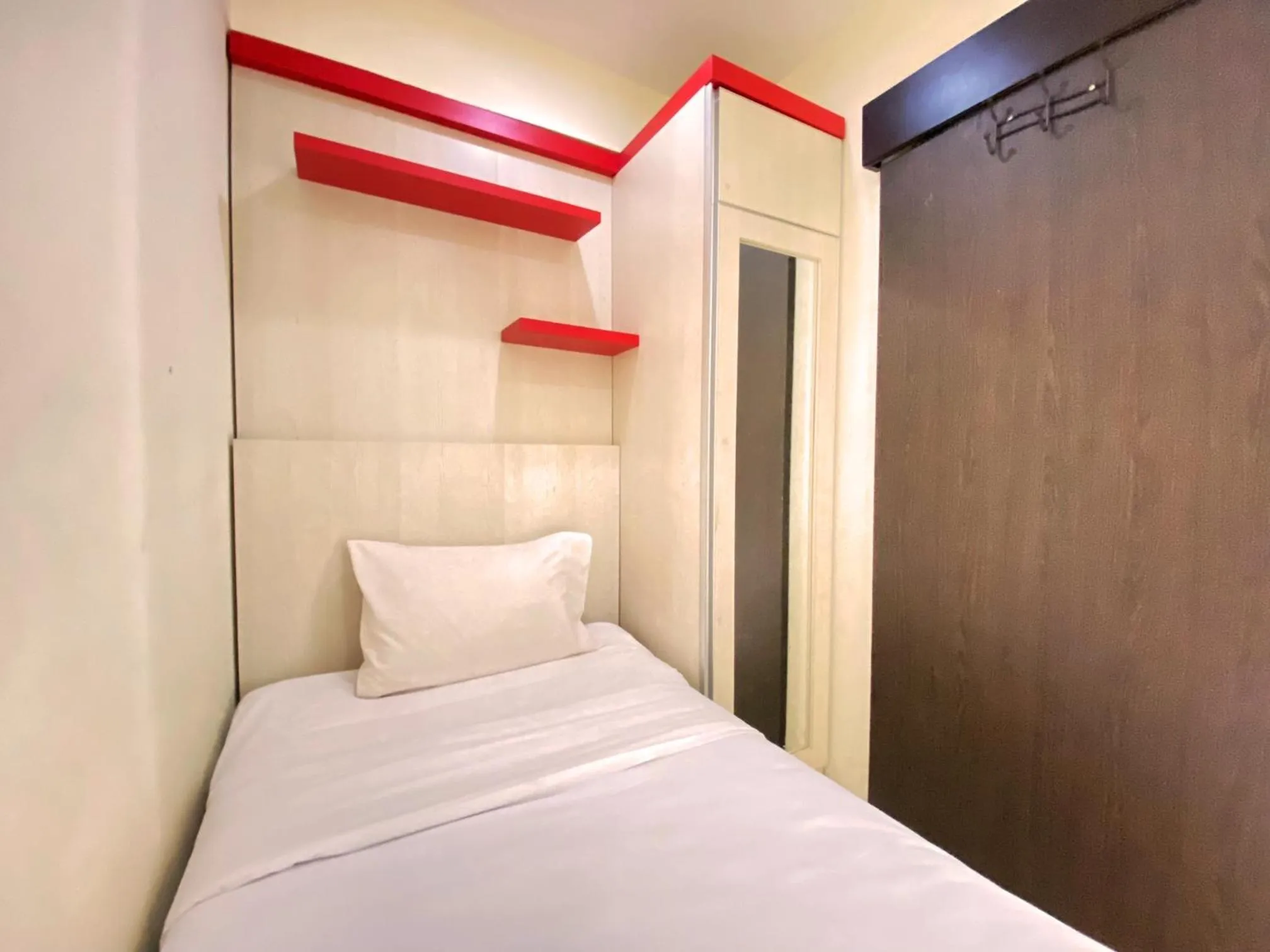 Bed in Spacious 2BR at Jarrdin Cihampelas Apartment By Travelio