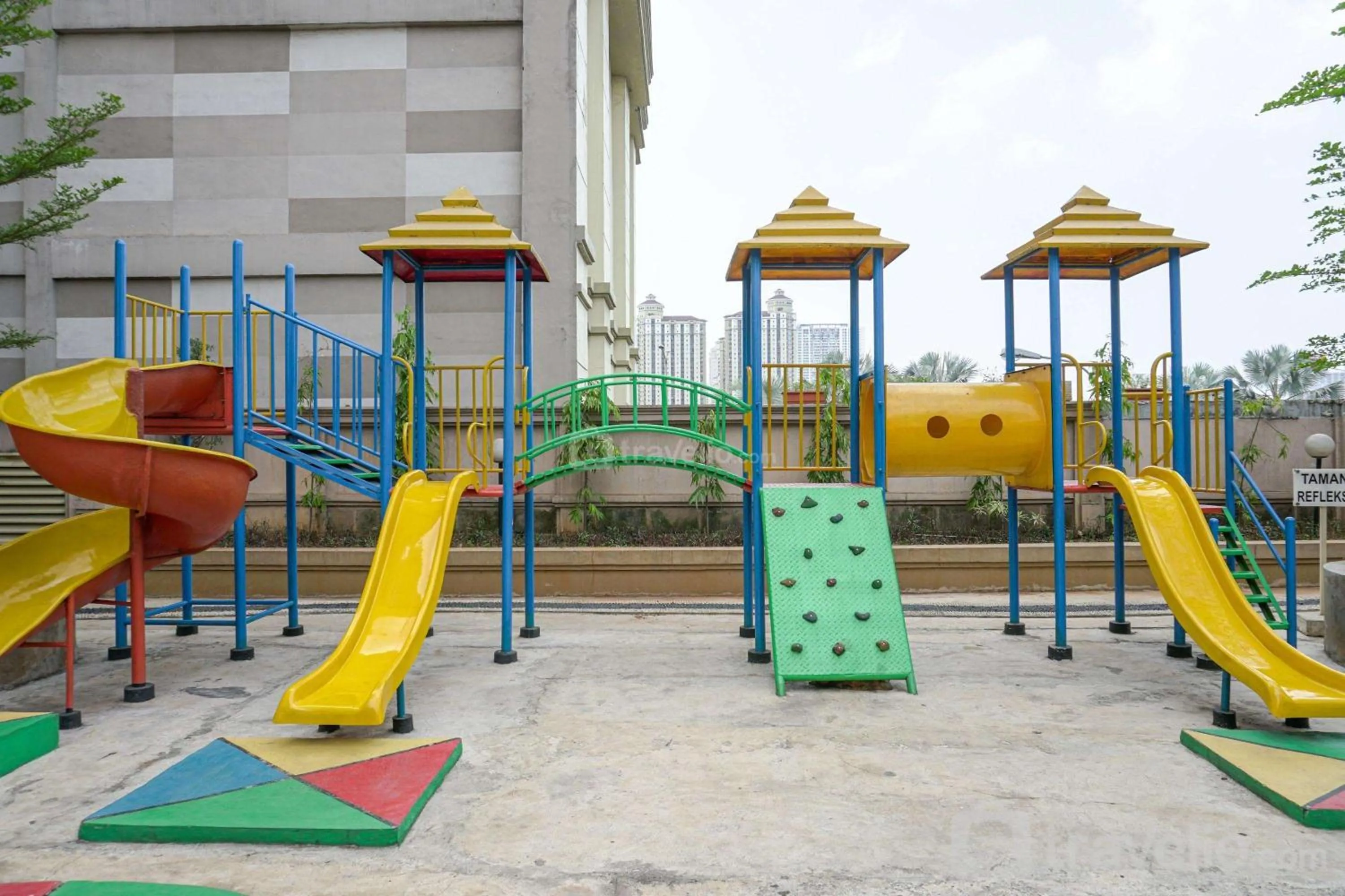 Children play ground in Relaxing 2BR at Grand Palace Kemayoran Apartment By Travelio