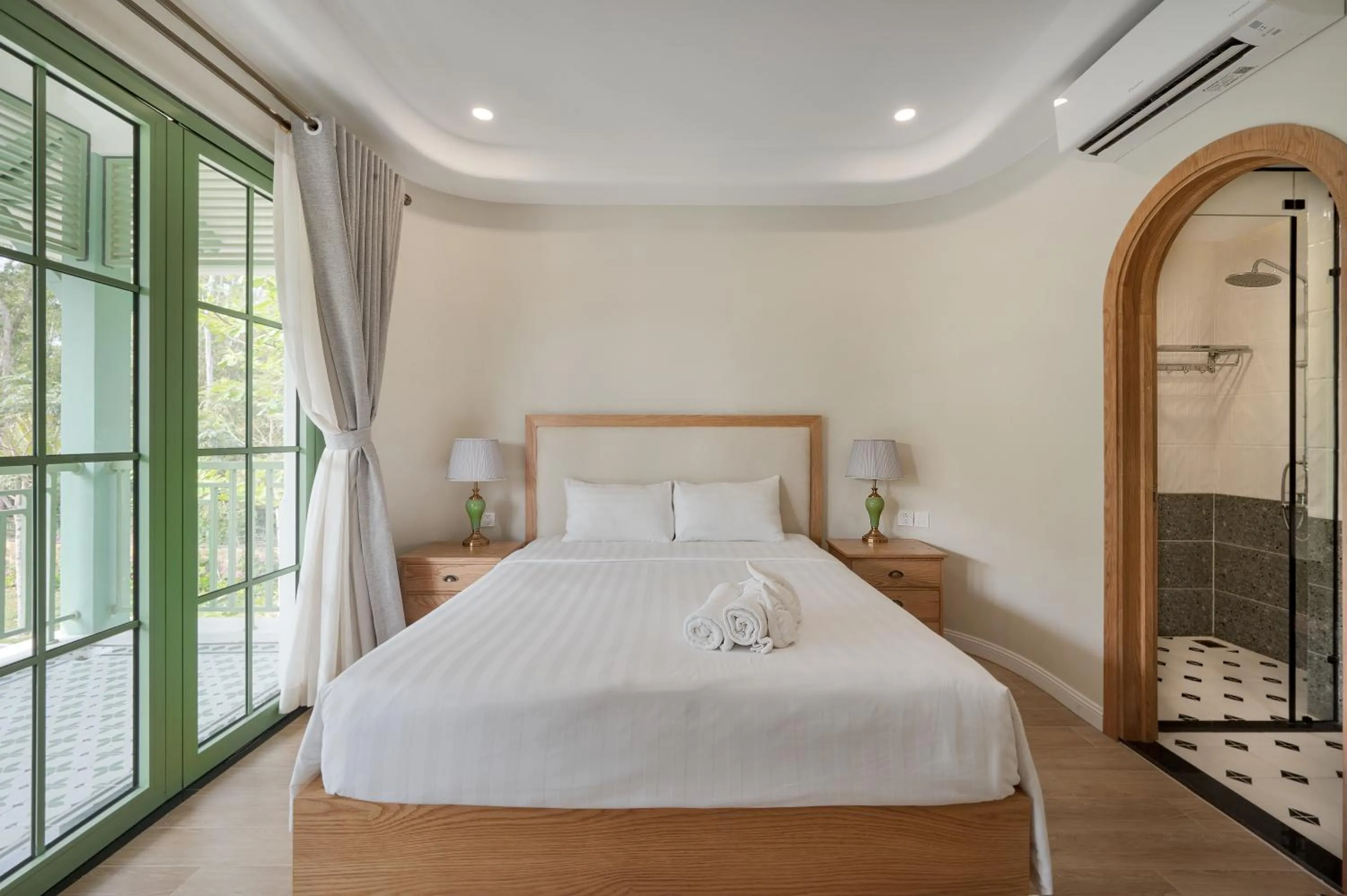 Bed in Elyday Apartment Hillside Phu Quoc - Sea & Firework view
