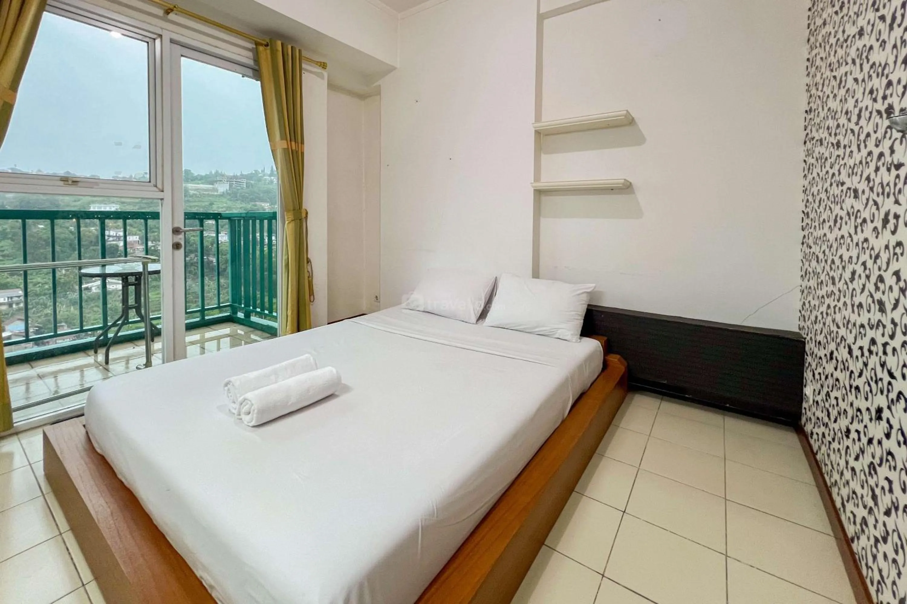 Bed in Cozy 1BR at Marbella Suites Dago Pakar Bandung Apartment By Travelio