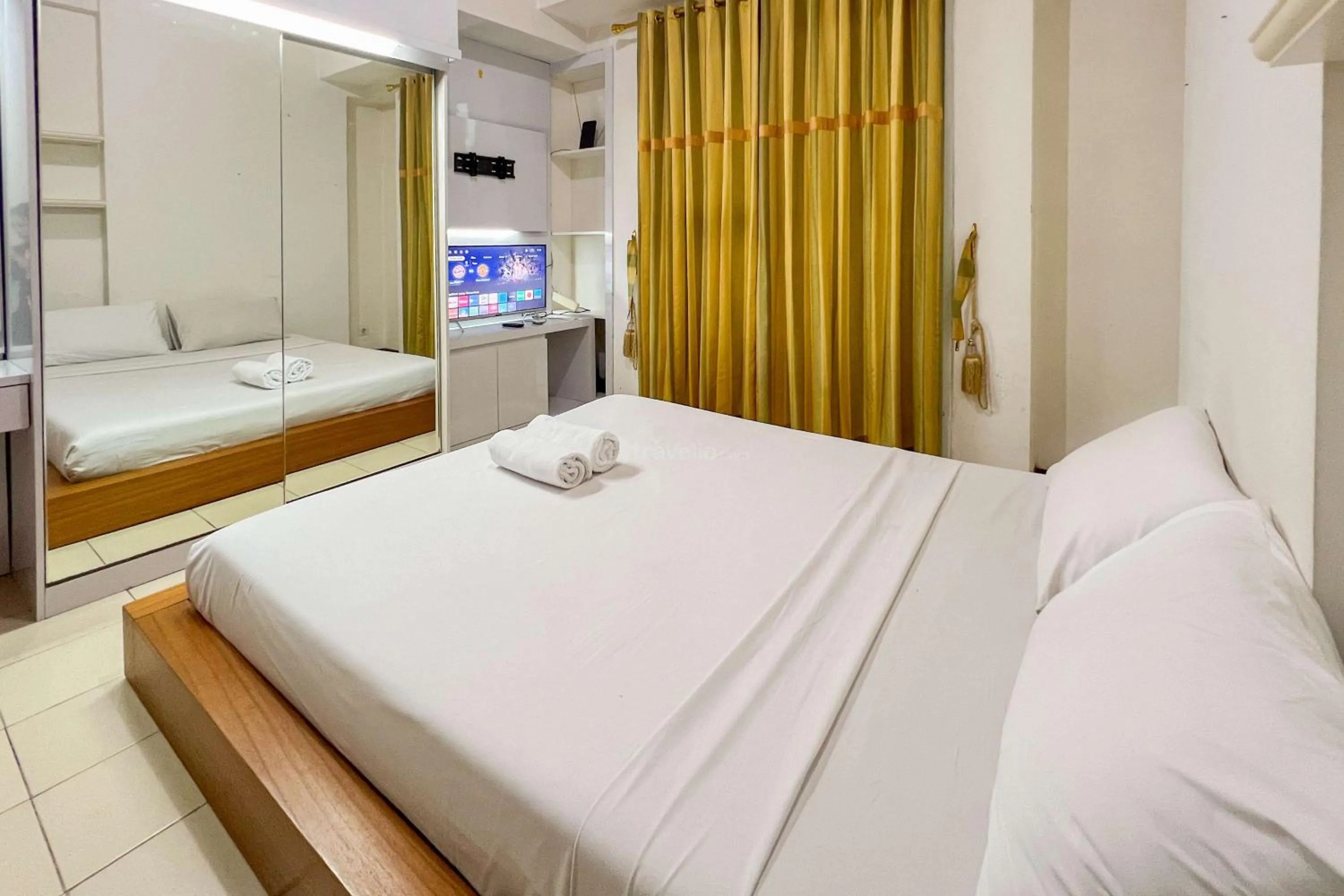 Bed in Cozy 1BR at Marbella Suites Dago Pakar Bandung Apartment By Travelio