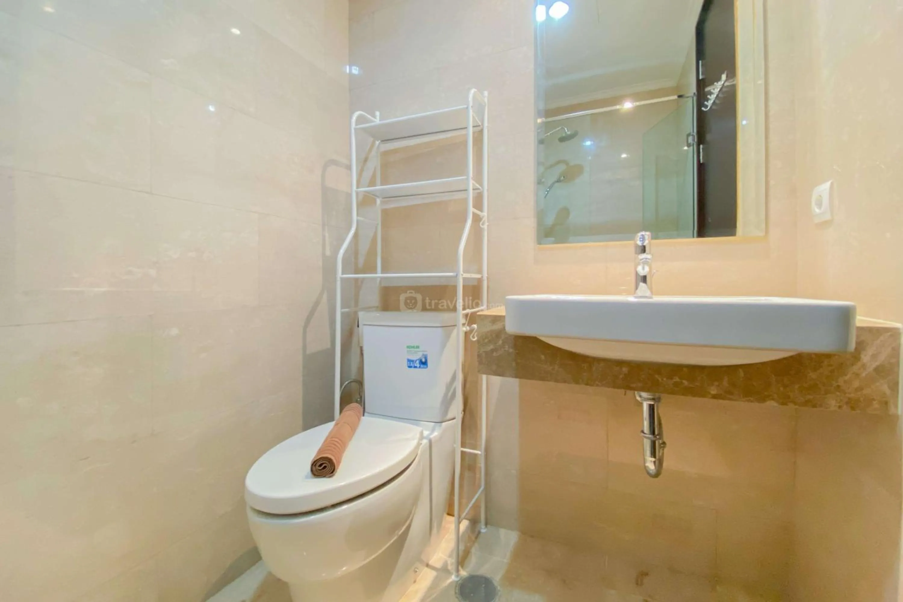 Bed in Good Choice and Elegant Studio Menteng Park Apartment By Travelio