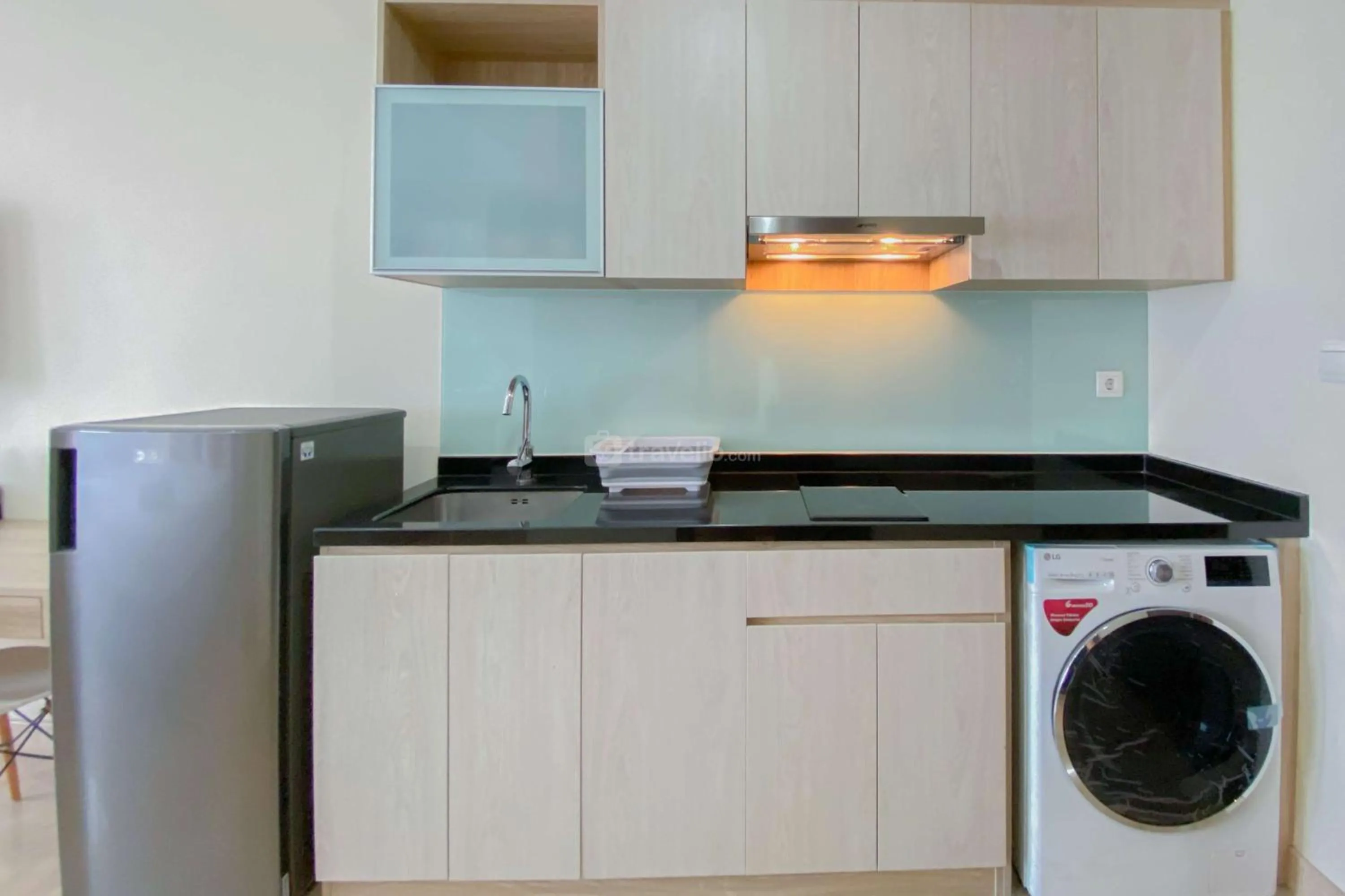 Bed in Good Choice and Elegant Studio Menteng Park Apartment By Travelio