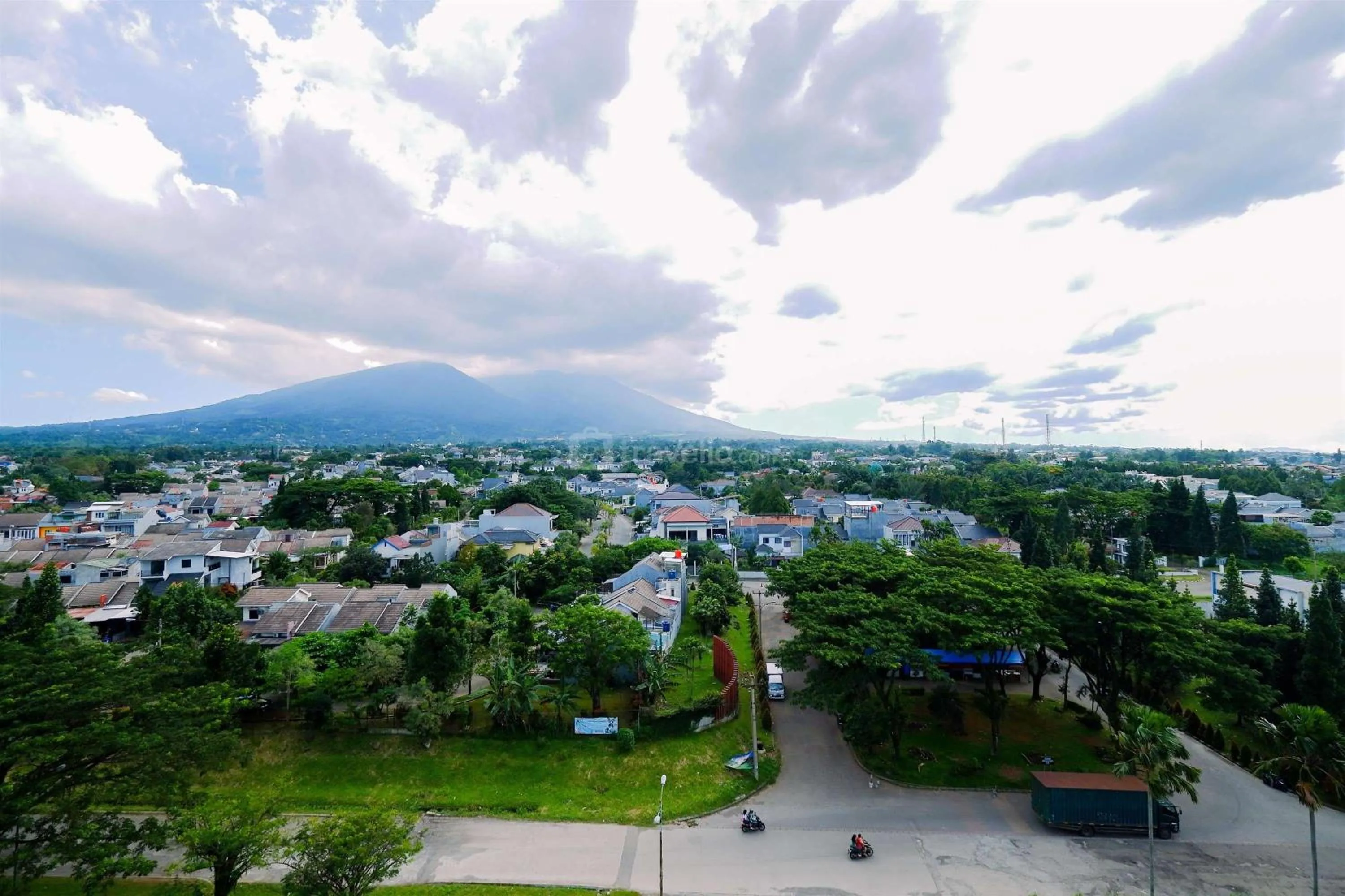 Bed in Warm and Cozy Living 2BR Bogorienze Apartment By Travelio