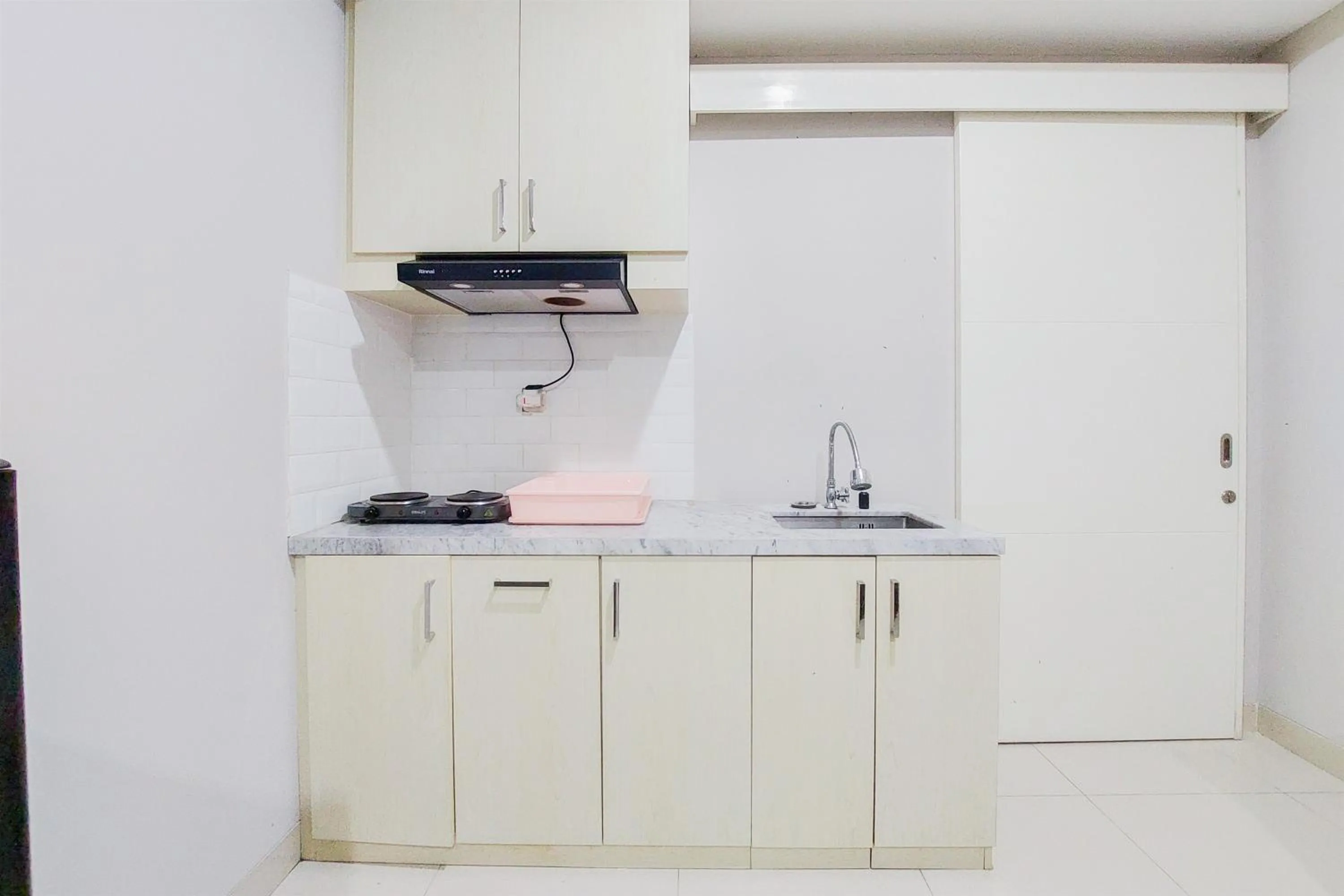Kitchen or kitchenette in Comfy and Modern Studio Room The Ayoma Apartment By Travelio