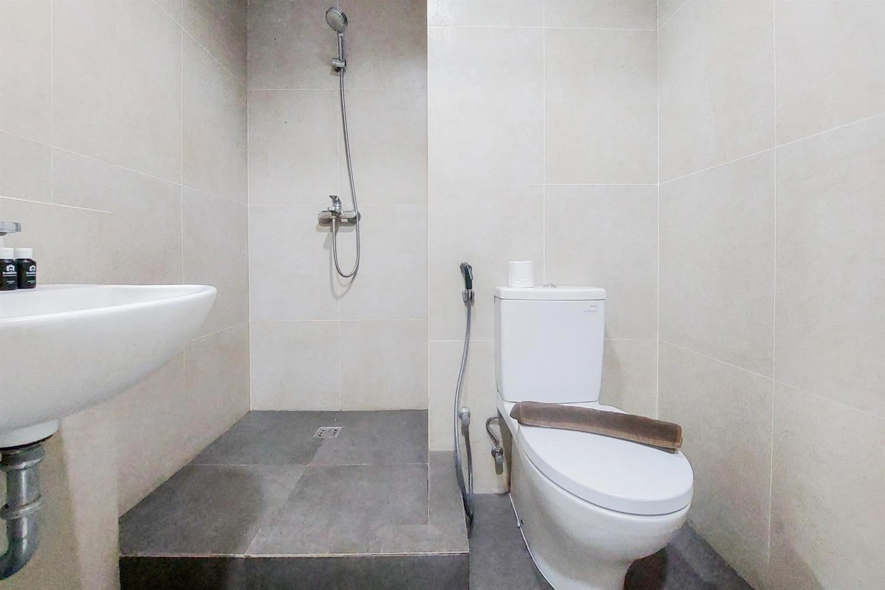 Bathroom in Comfy and Modern Studio Room The Ayoma Apartment By Travelio