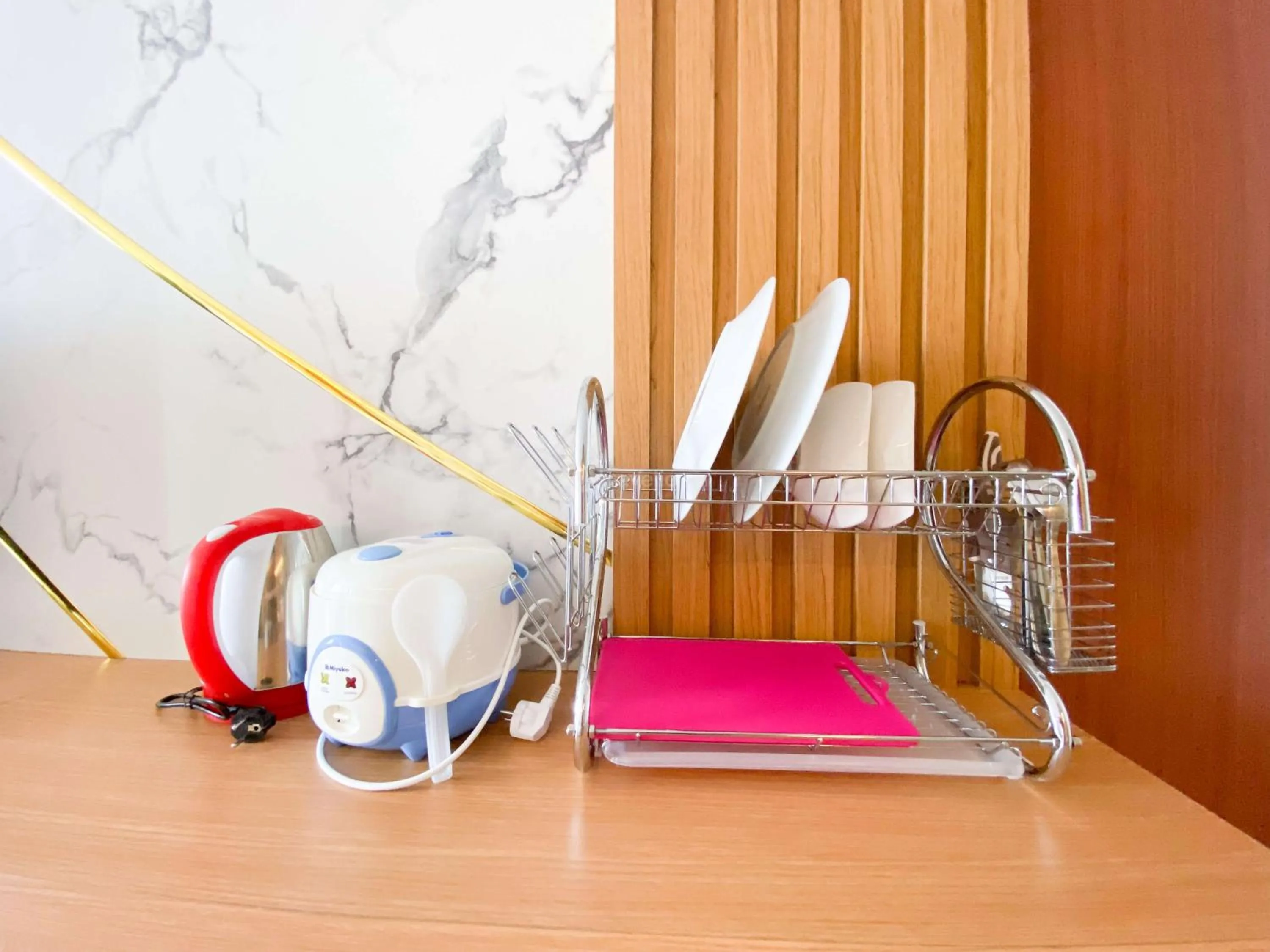 Bed in Homey and Strategic Studio (No Kitchen) at Sentraland Semarang Apartment By Travelio