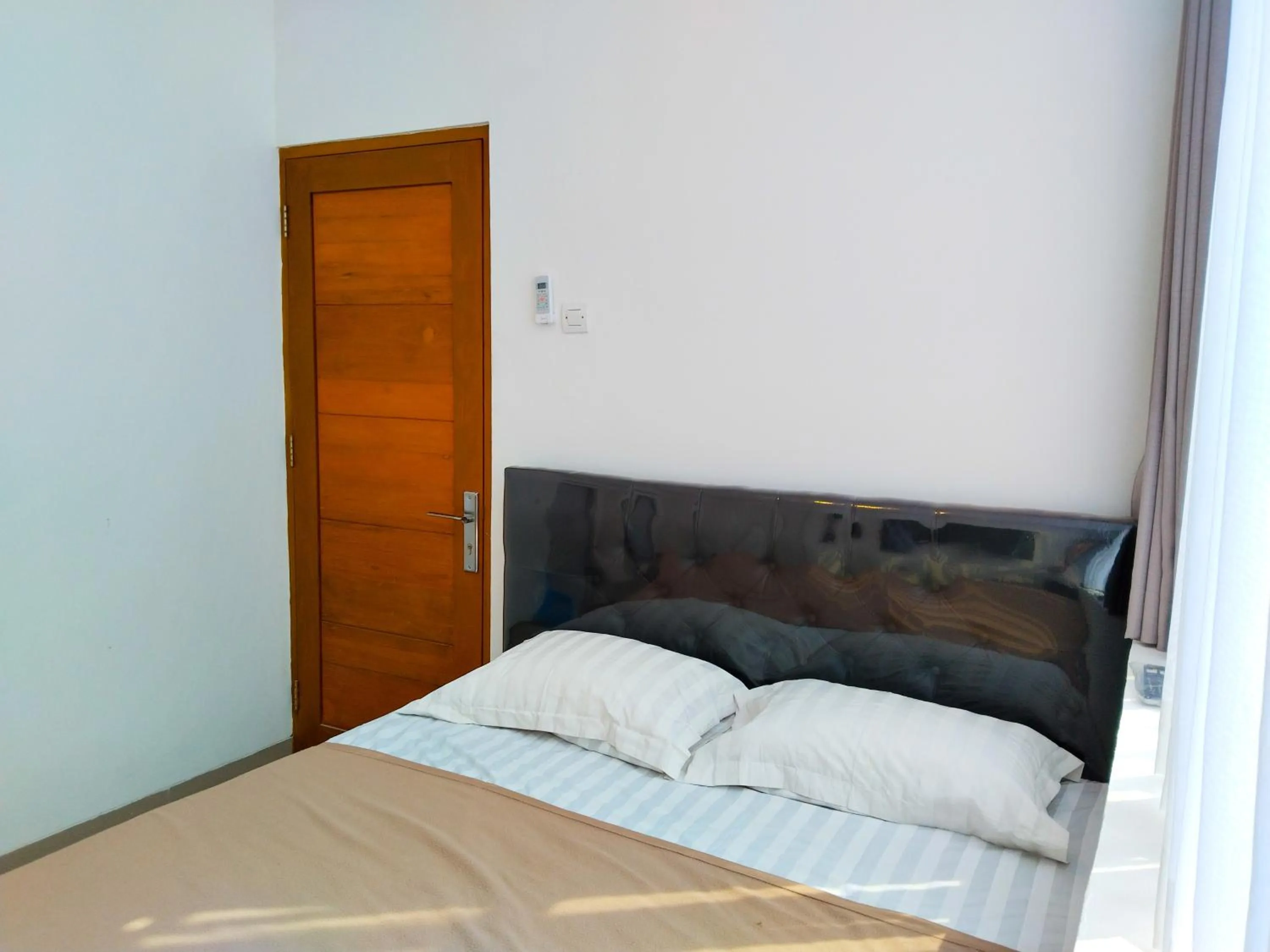 Bed in Themas Guest House