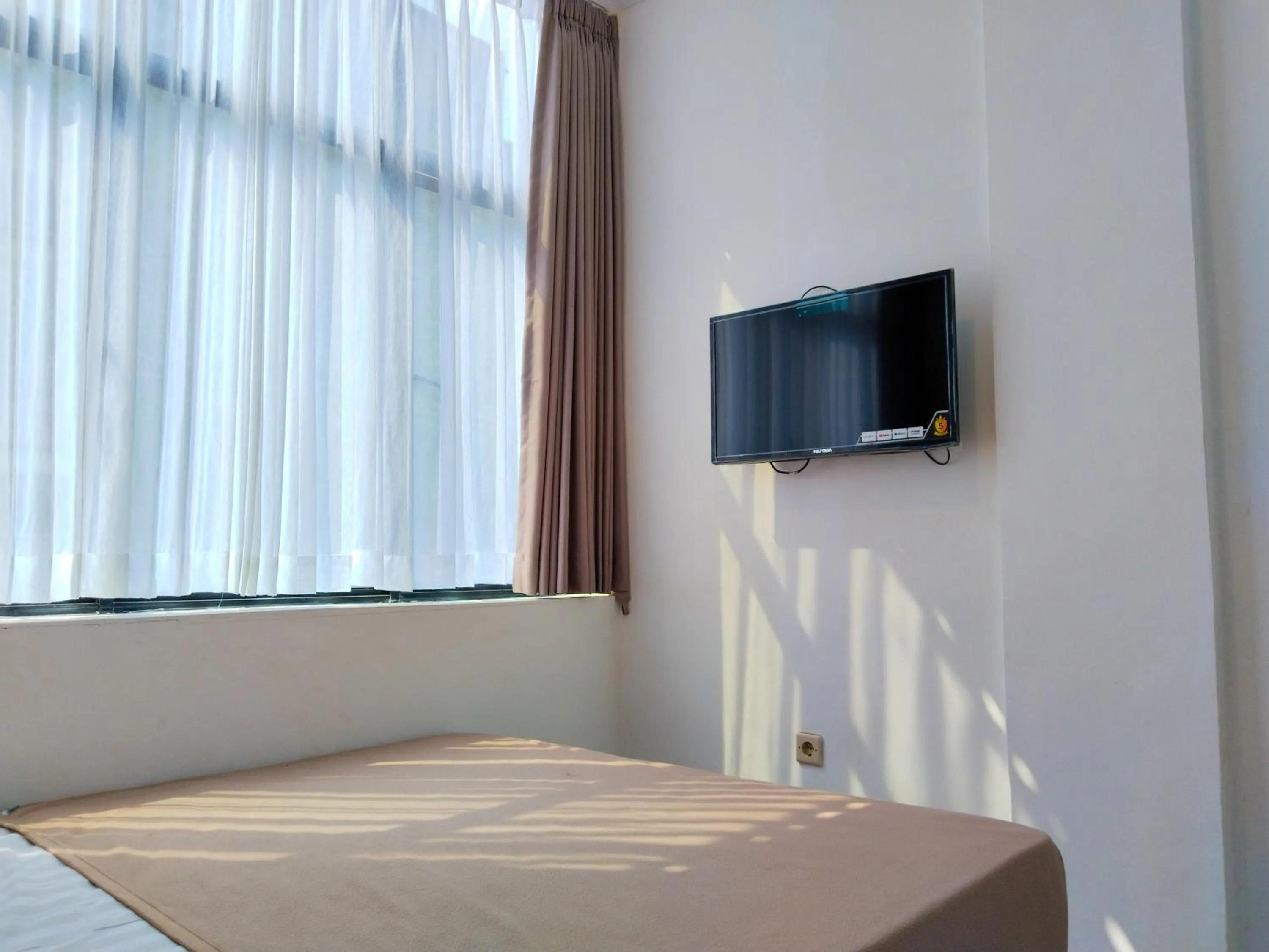 Bed in Themas Guest House