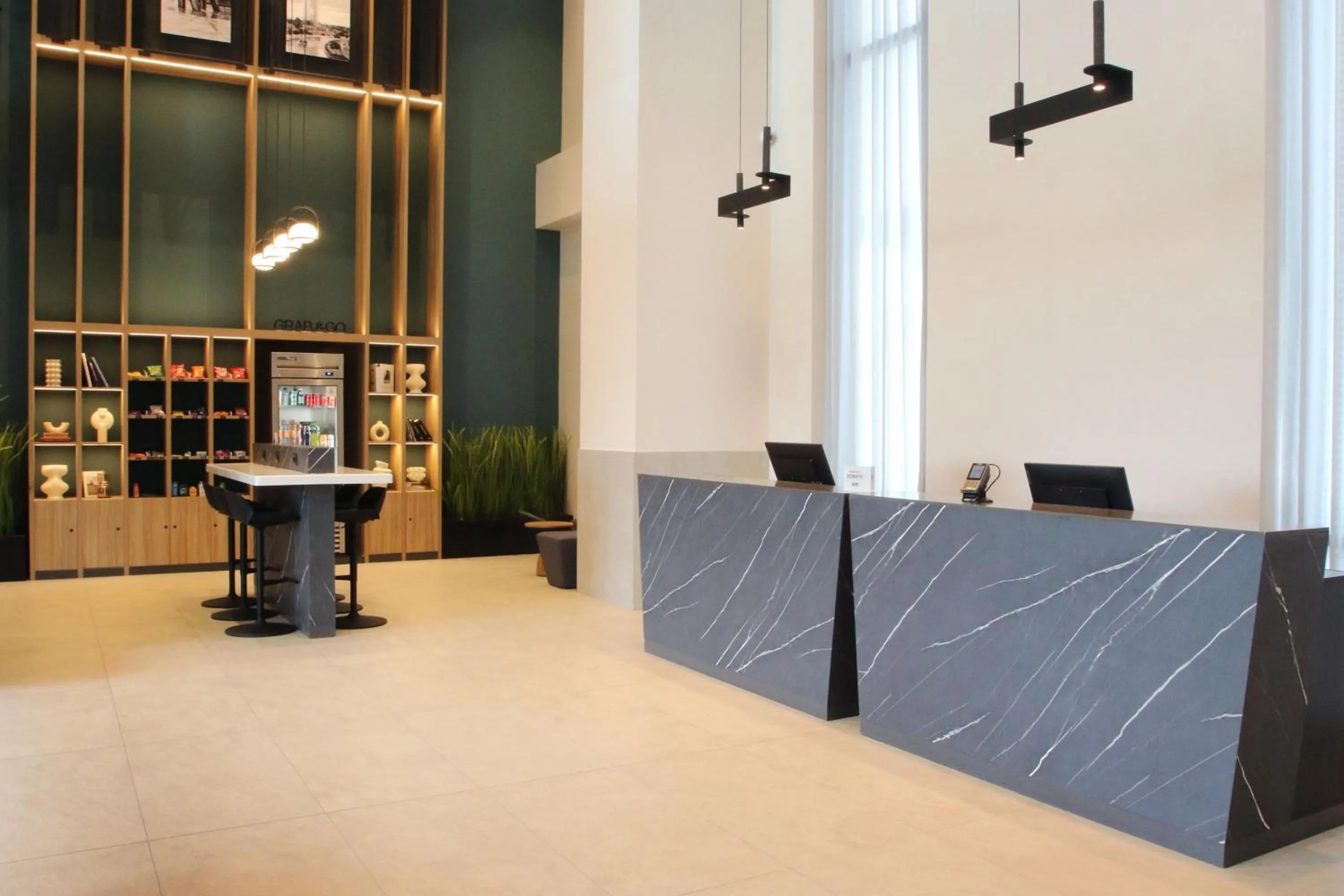 Lobby or reception in City Express Plus by Marriott Monterrey Centro