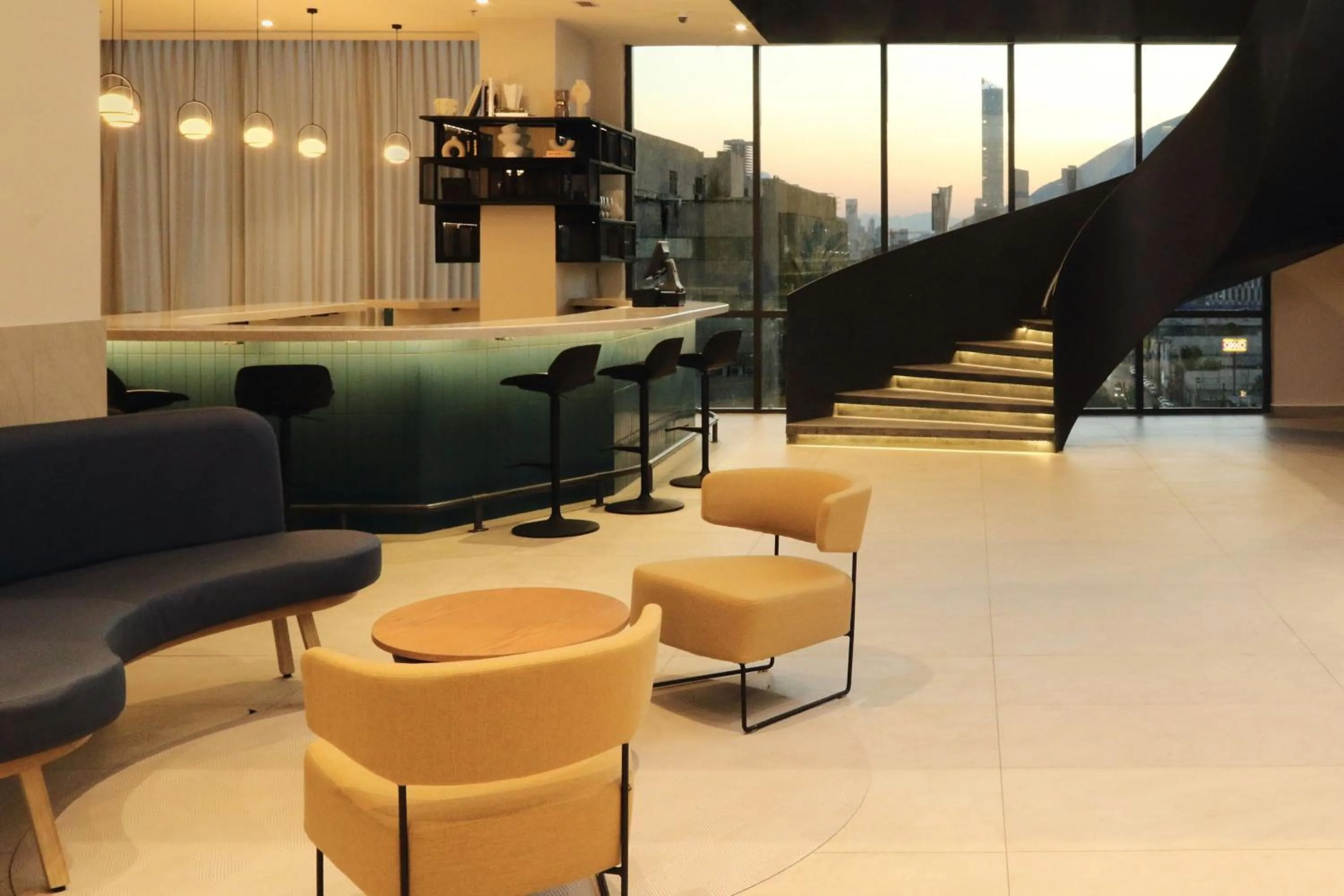 Lobby or reception in City Express Plus by Marriott Monterrey Centro