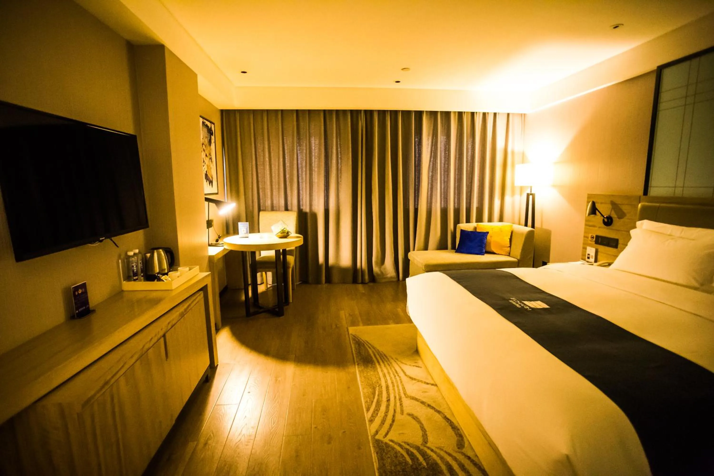 Bed in Echarm Hotel - Jingmen Yintai City Jingchu Institute of Technology