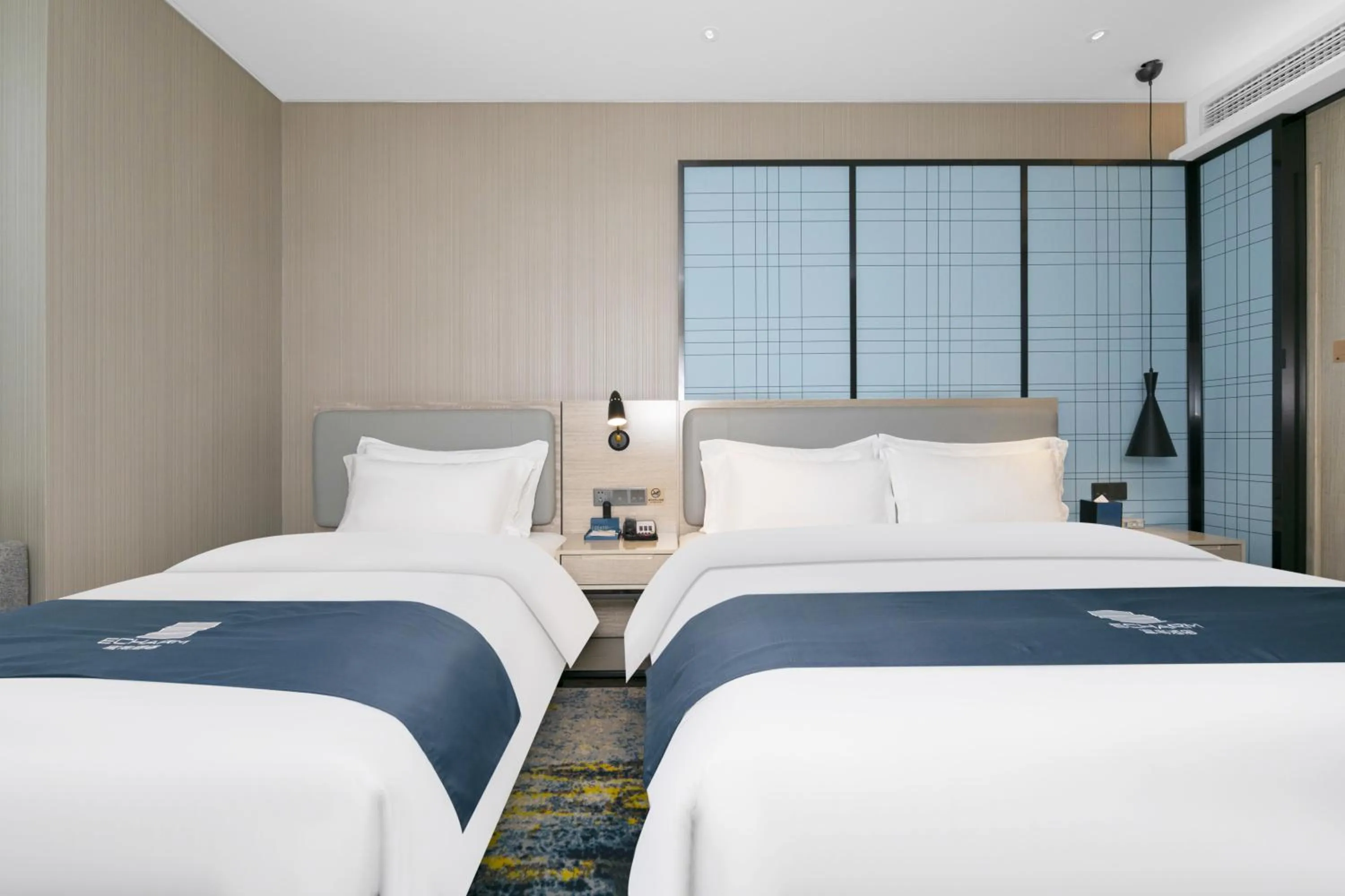 Bed in Echarm Hotel - Jingmen Yintai City Jingchu Institute of Technology