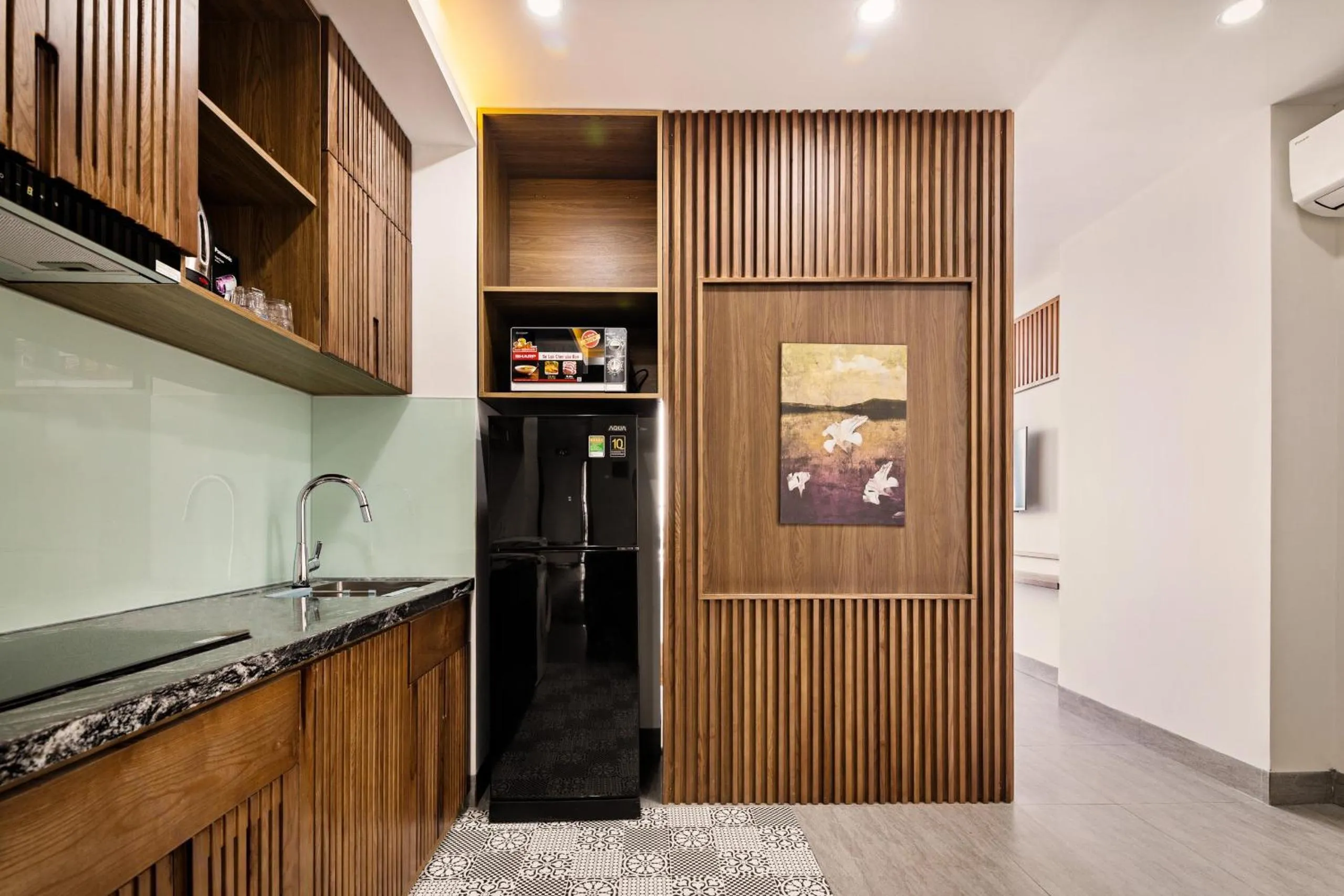 Kitchen or kitchenette in Hoàng Thịnh Hotel & Apartment Danang