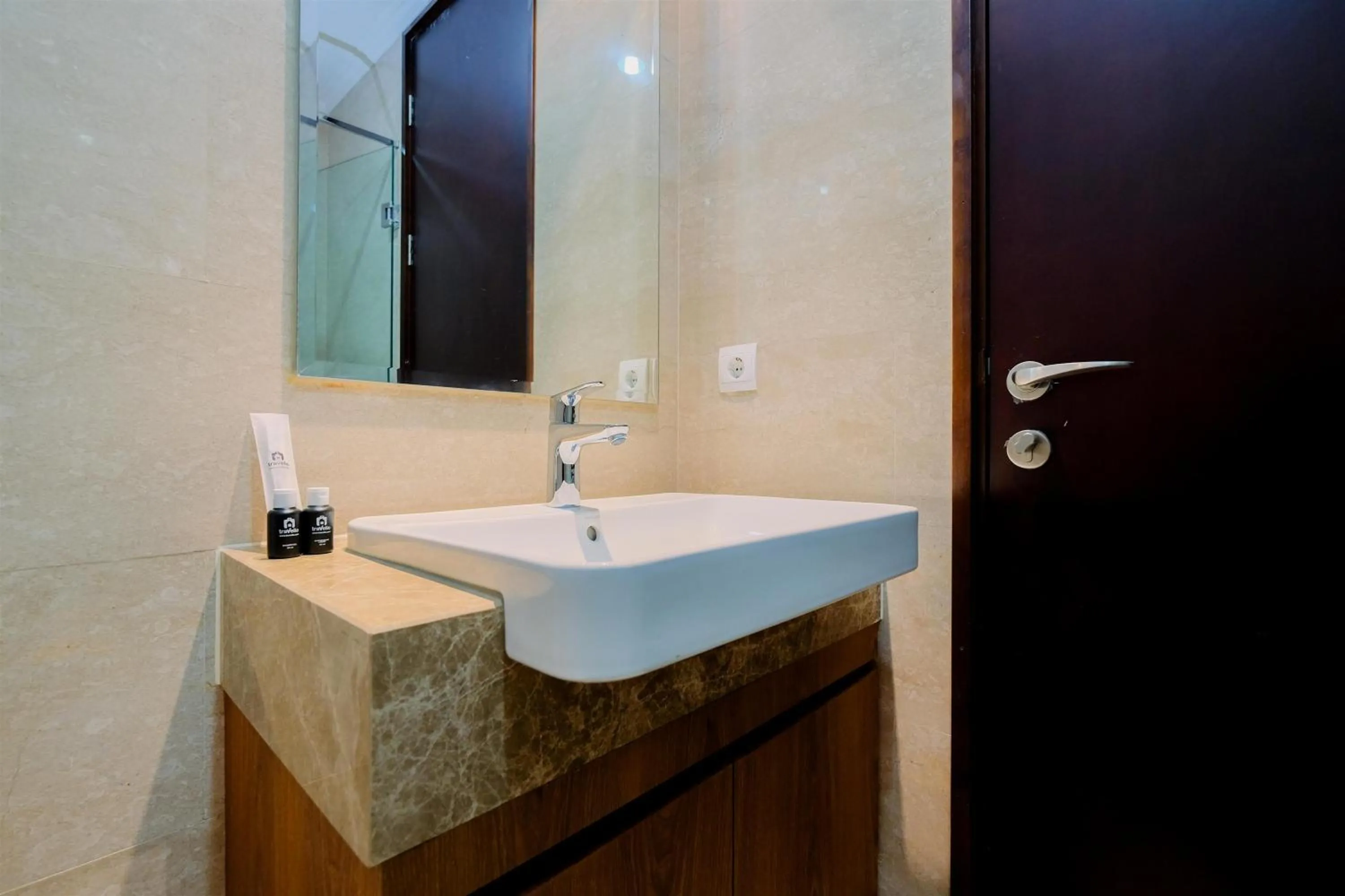 Bathroom in Comfort and Modern Look Studio Menteng Park Apartment By Travelio