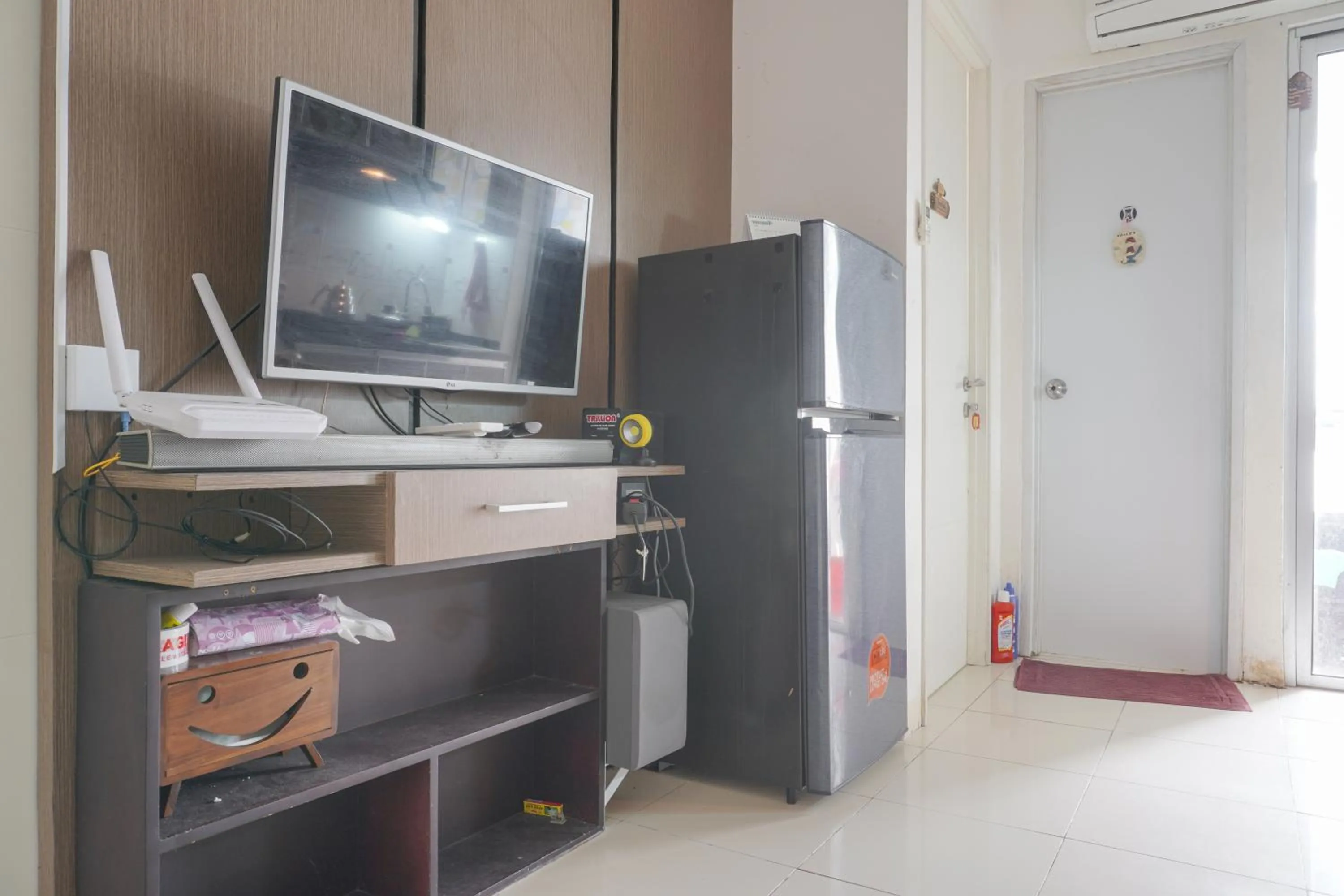 TV and multimedia in Best Startegic 2BR at Bassura Apartment By Travelio