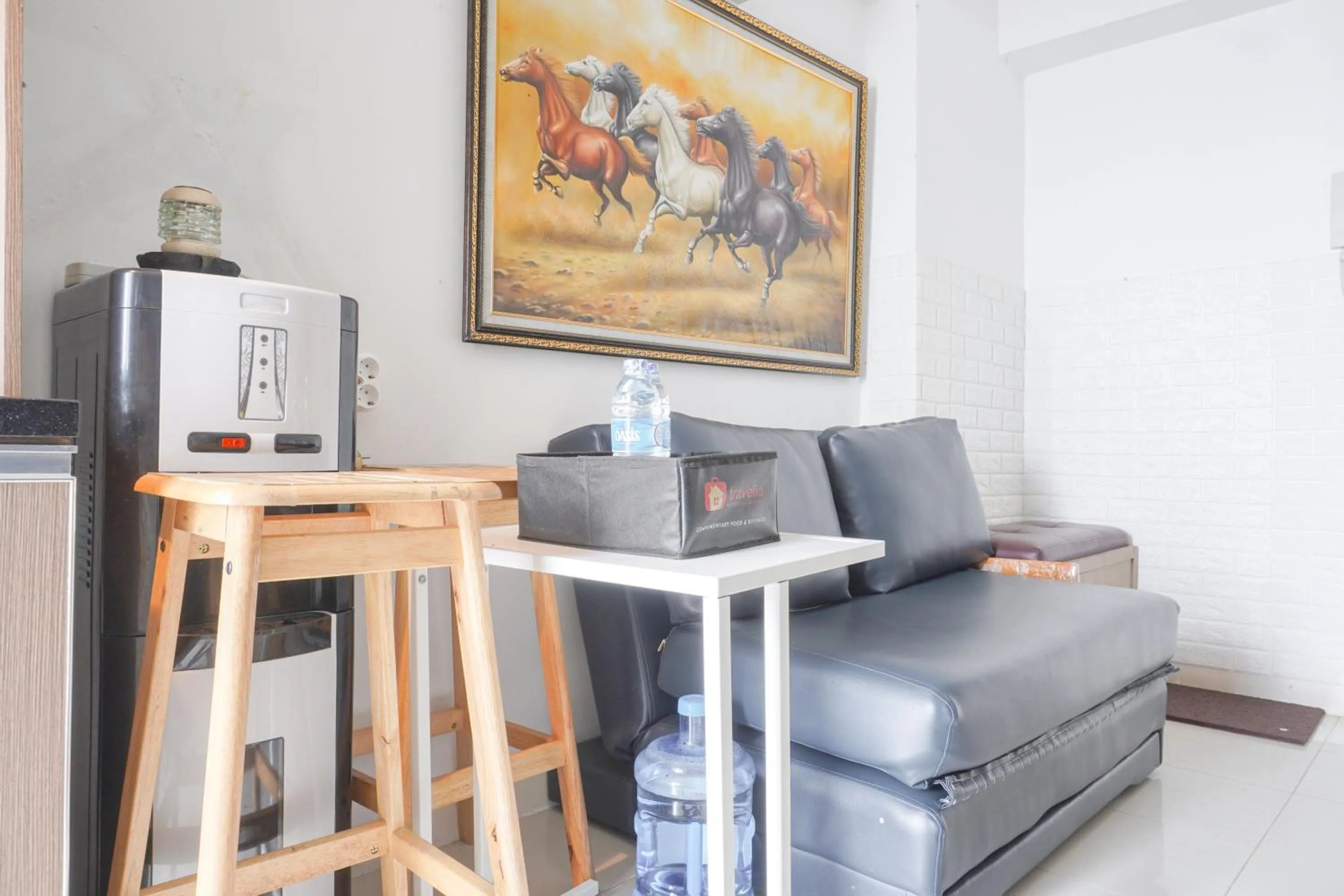 Seating area in Best Startegic 2BR at Bassura Apartment By Travelio