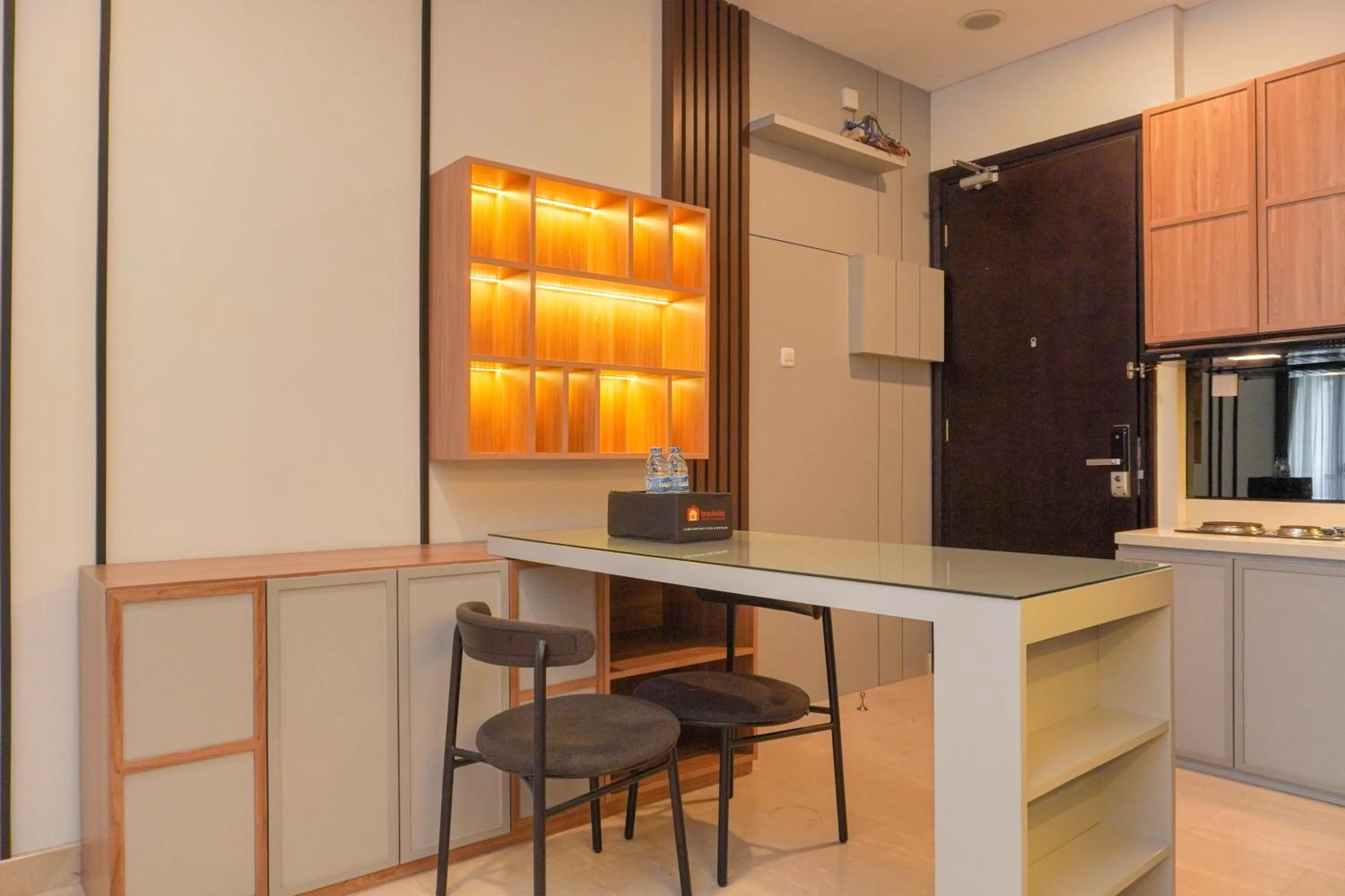 Dining area in Comfort and Elegant 2BR Sudirman Suites Apartment By Travelio