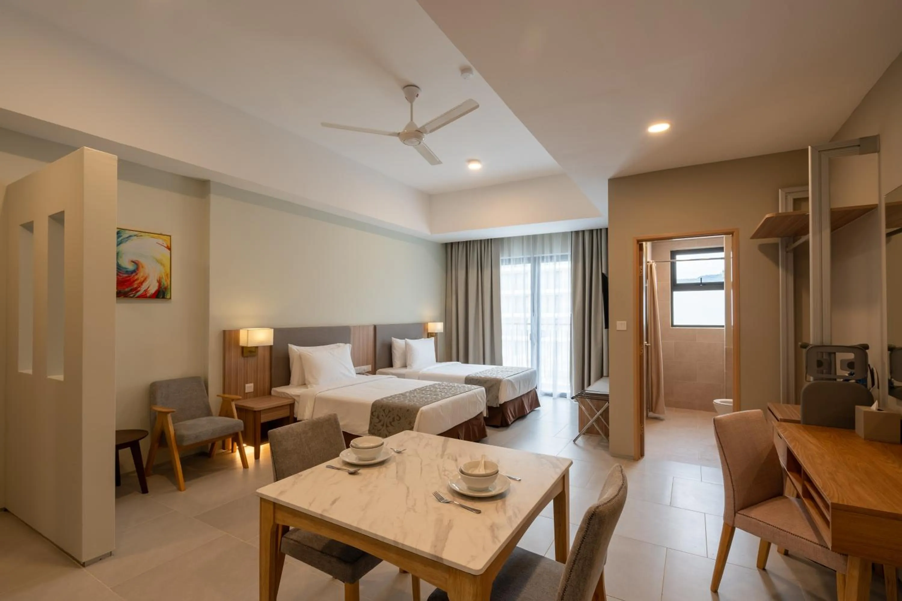 Bed in Zenith Suites Cameron