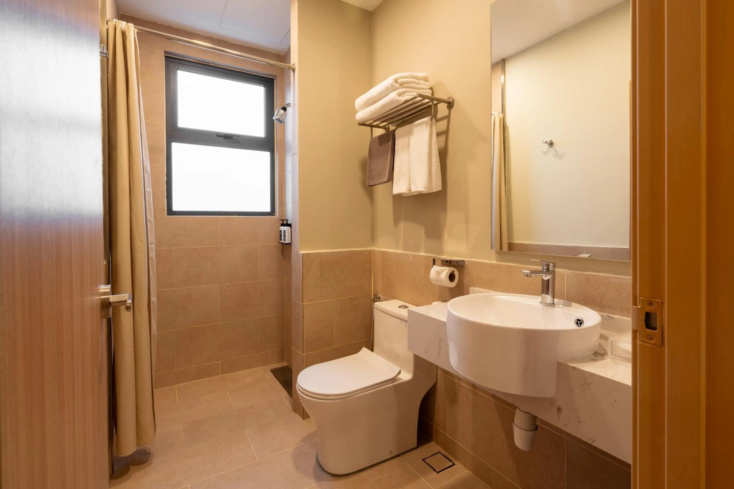 Toilet in Zenith Suites Cameron