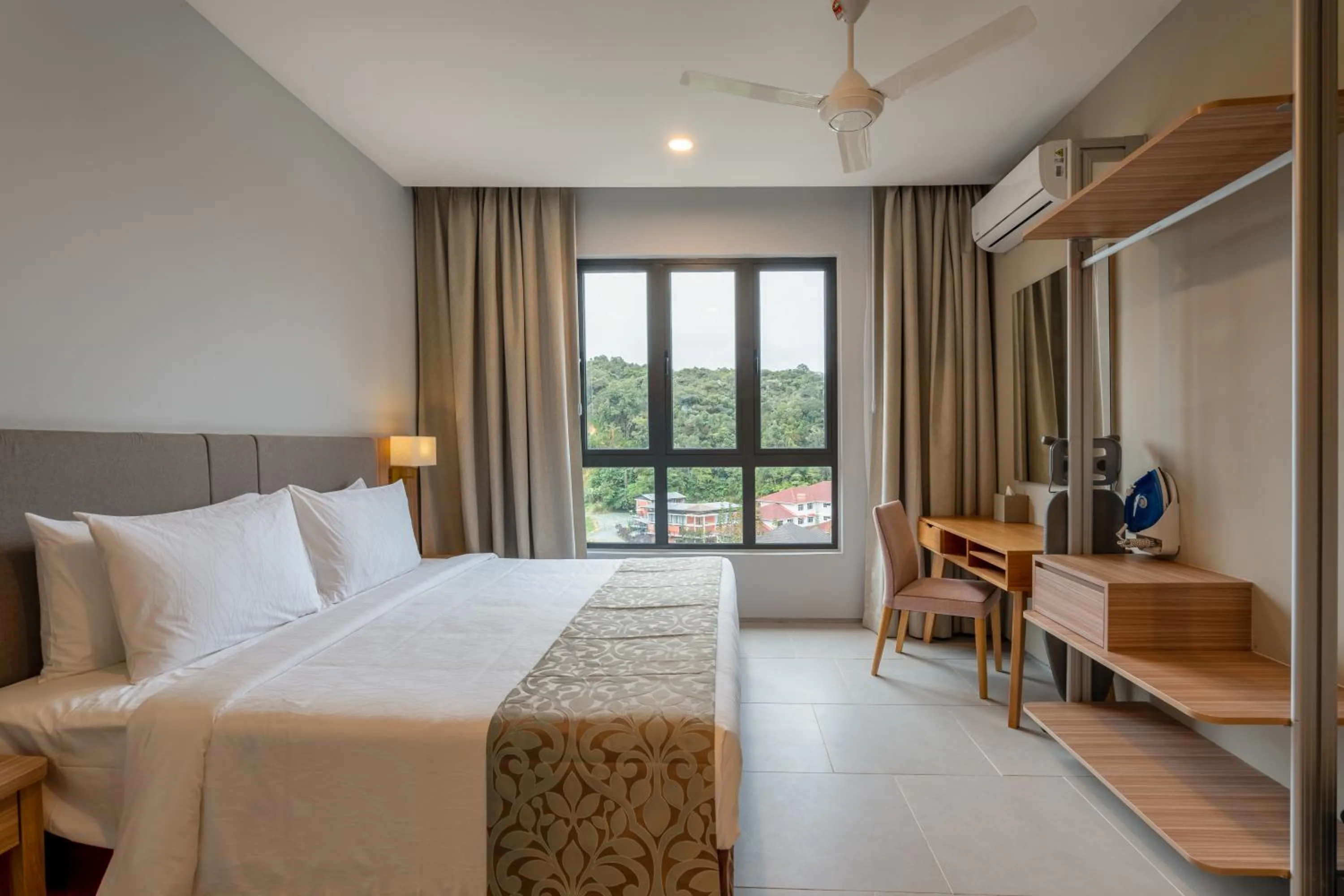 Bed in Zenith Suites Cameron