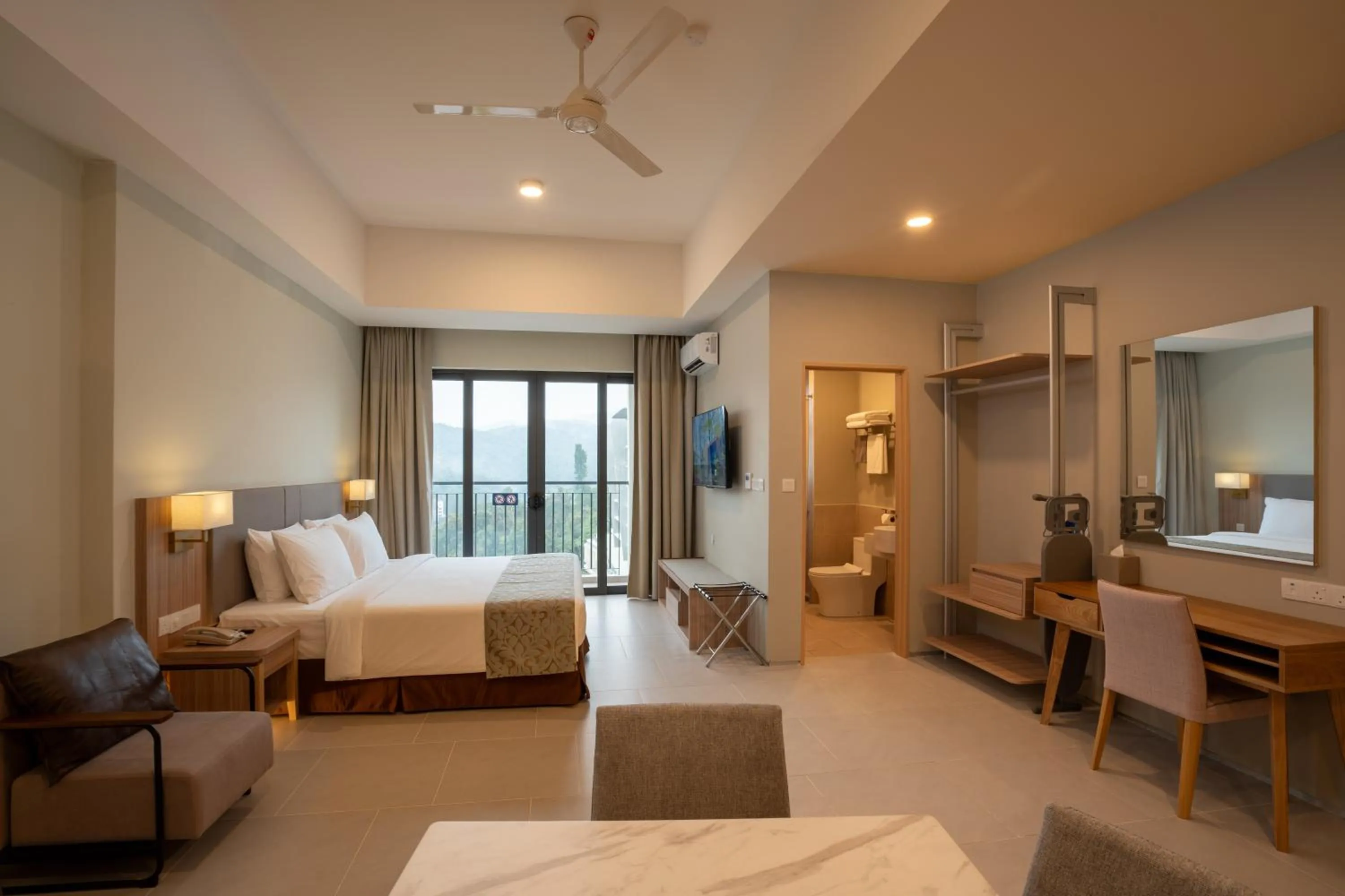 Bed in Zenith Suites Cameron