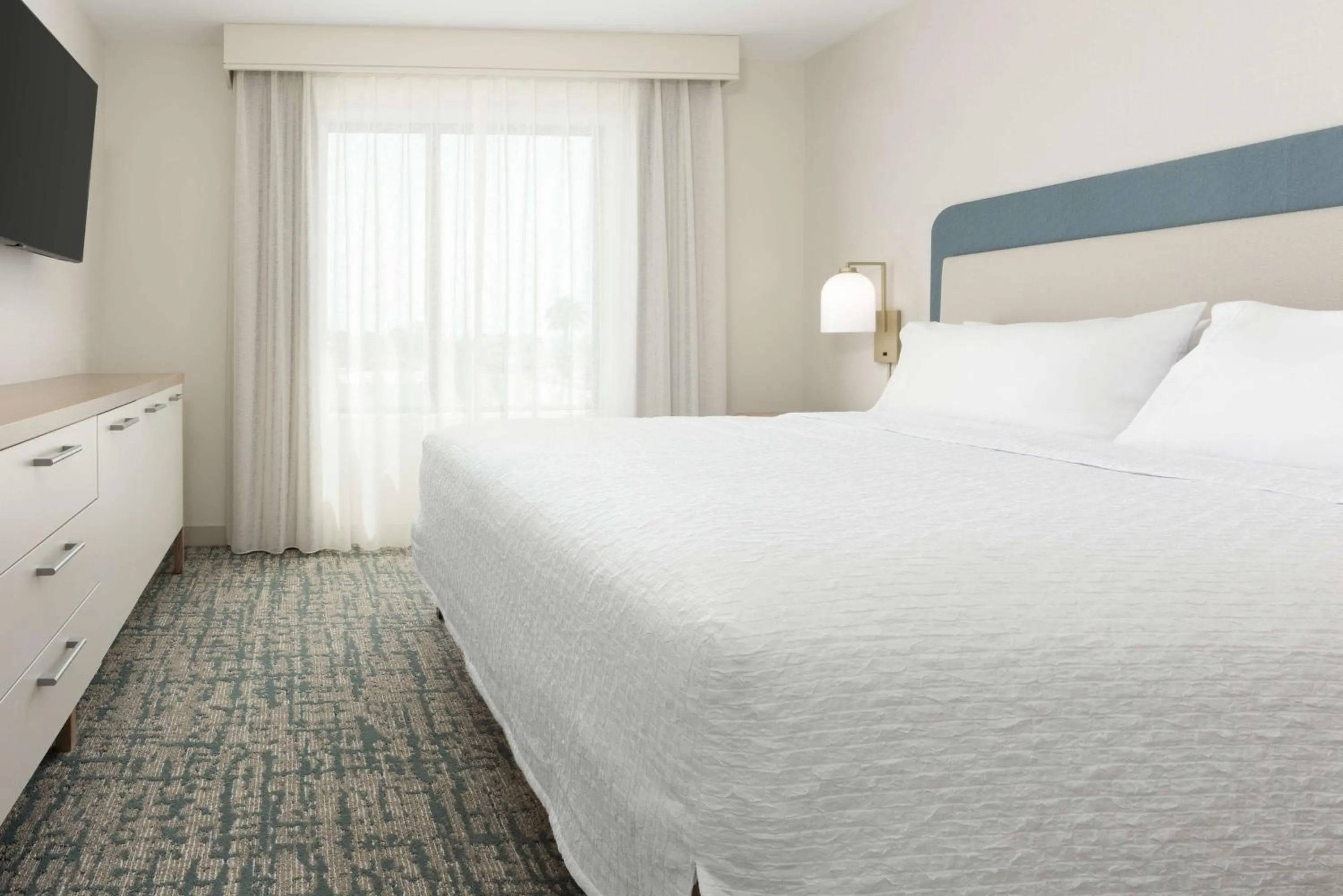 Bed in Homewood Suites by Hilton Cypress Orange County