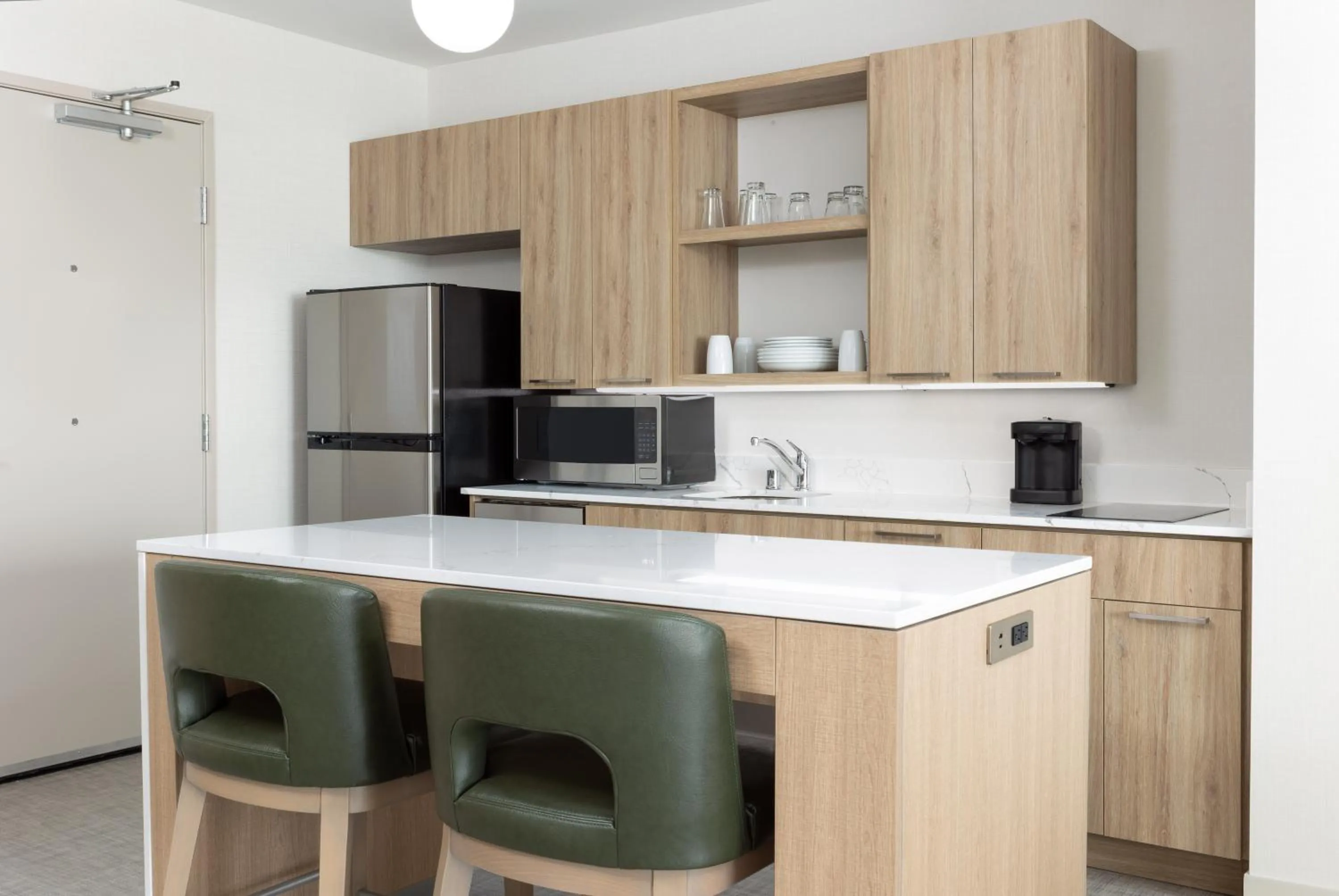 Kitchen or kitchenette in Homewood Suites by Hilton Cypress Orange County