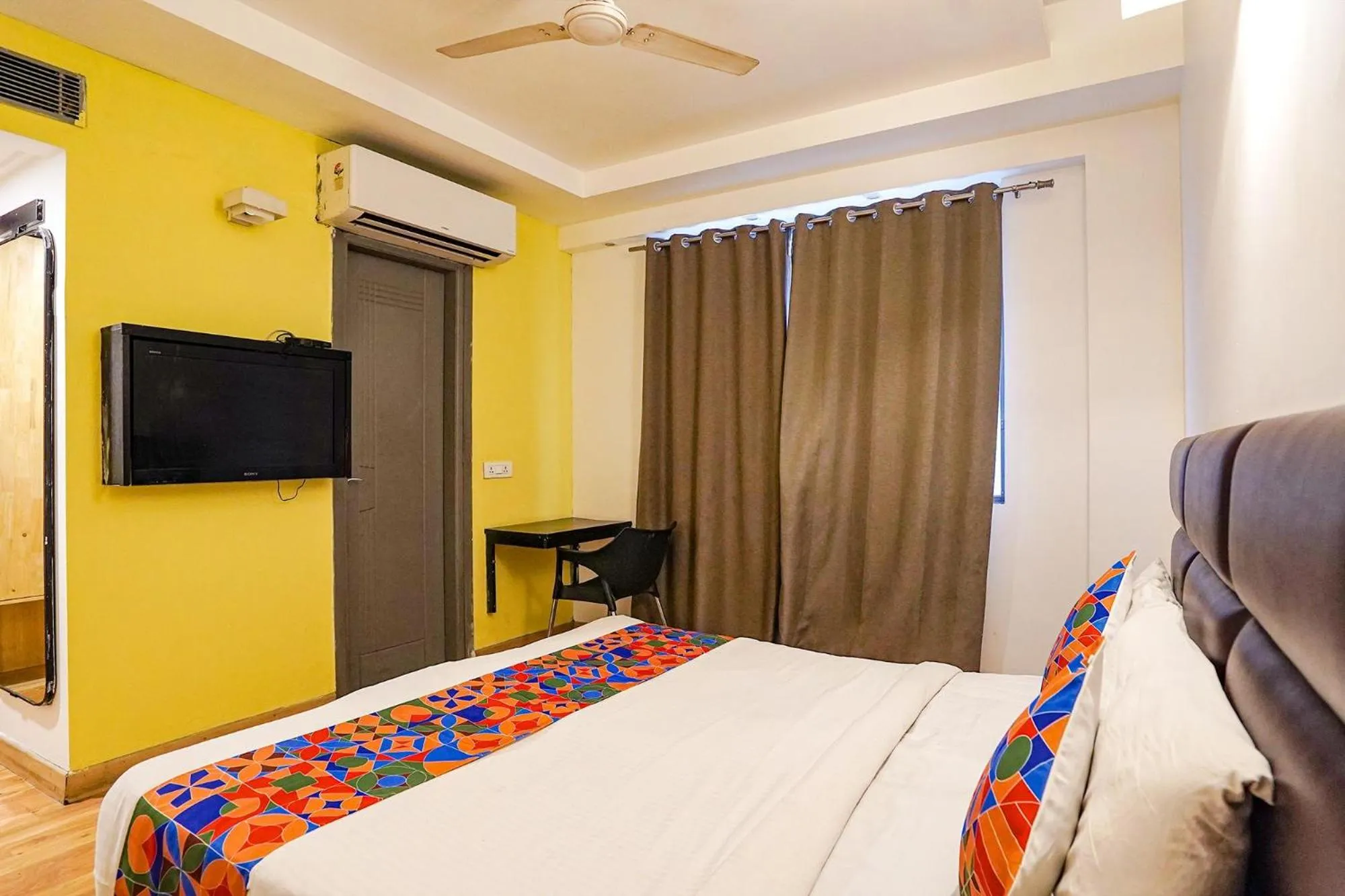 Bed in FabHotel Kaushambi