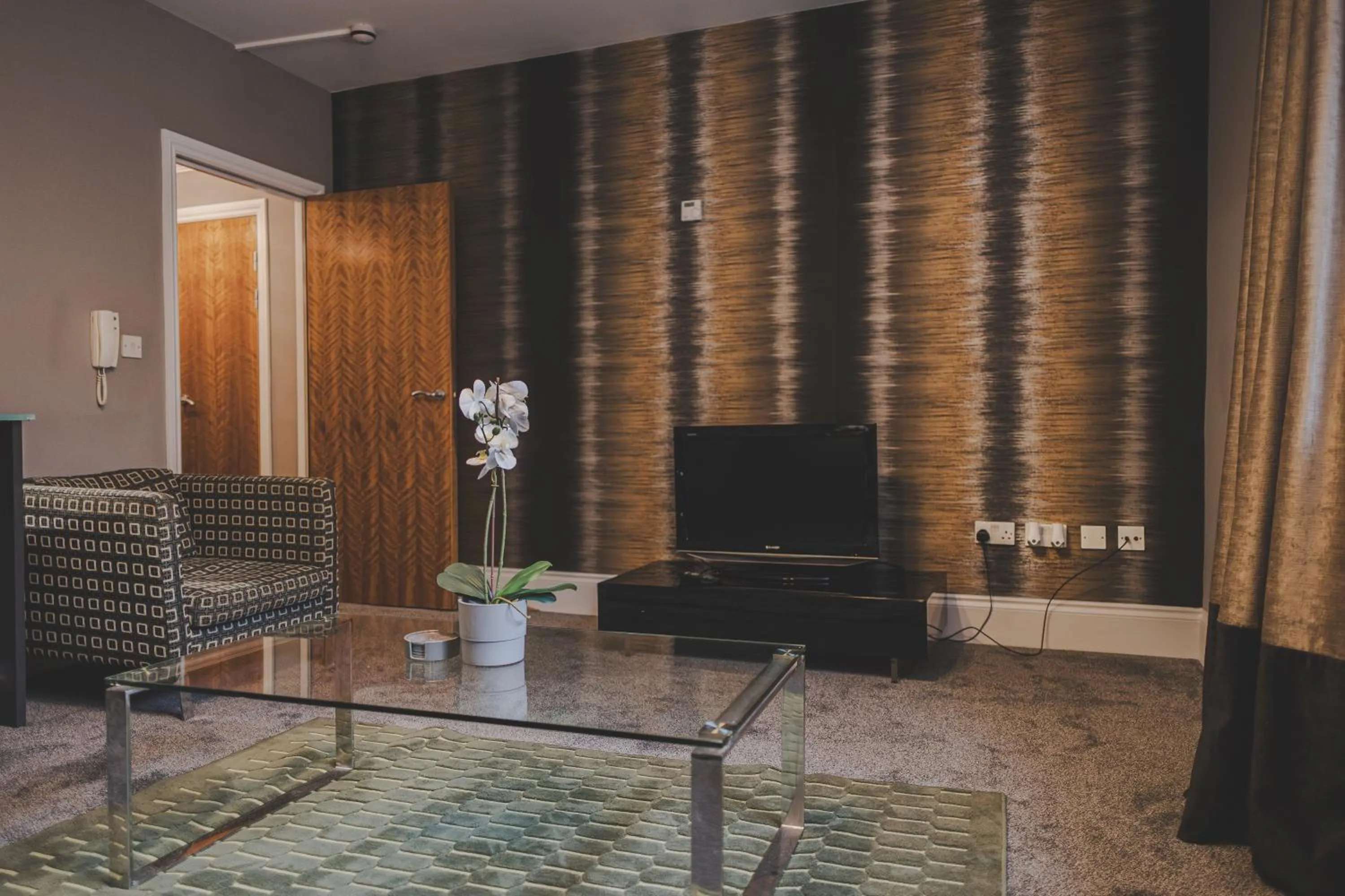 Living room in Kensington House by Warren Collection