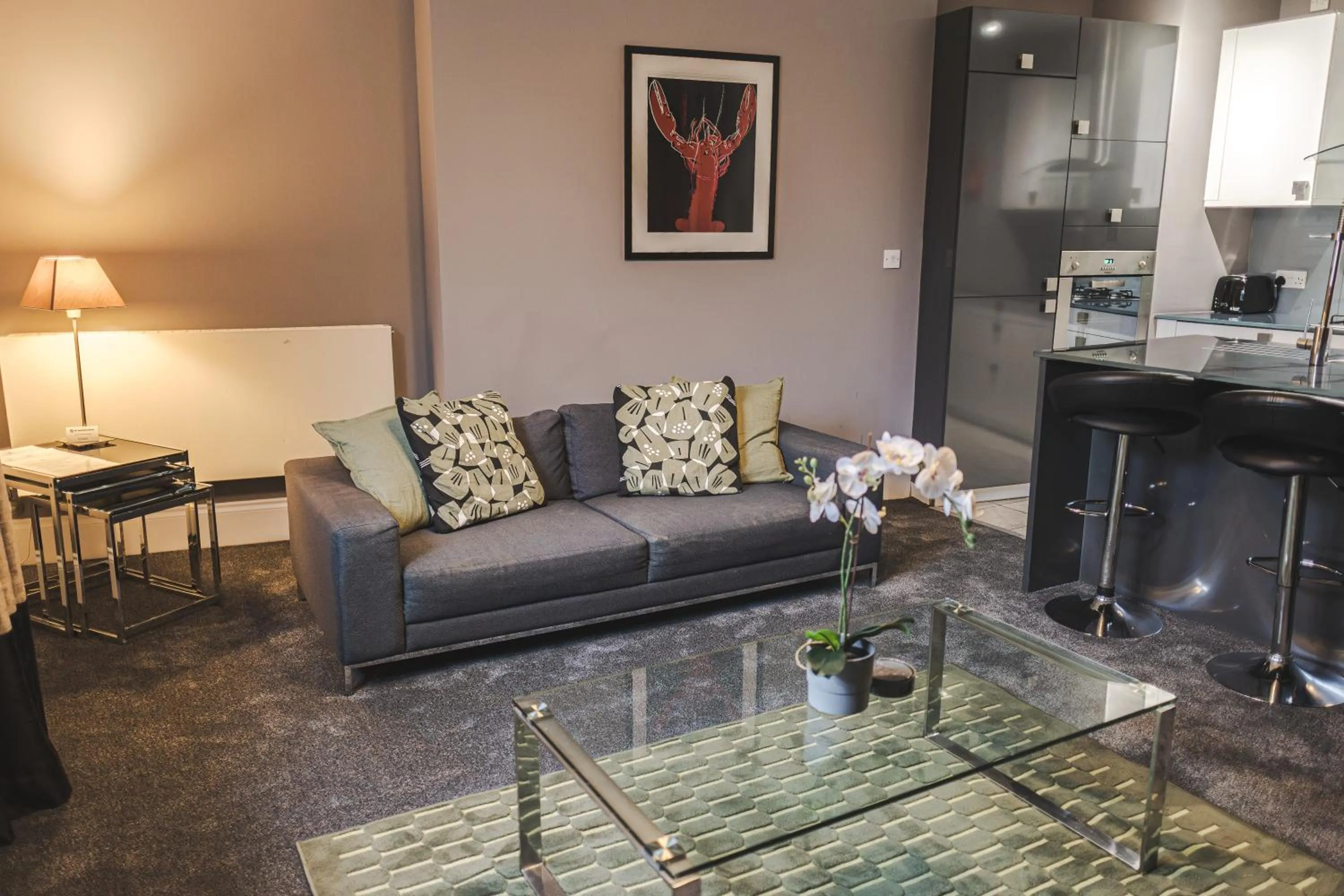 Living room in Kensington House by Warren Collection