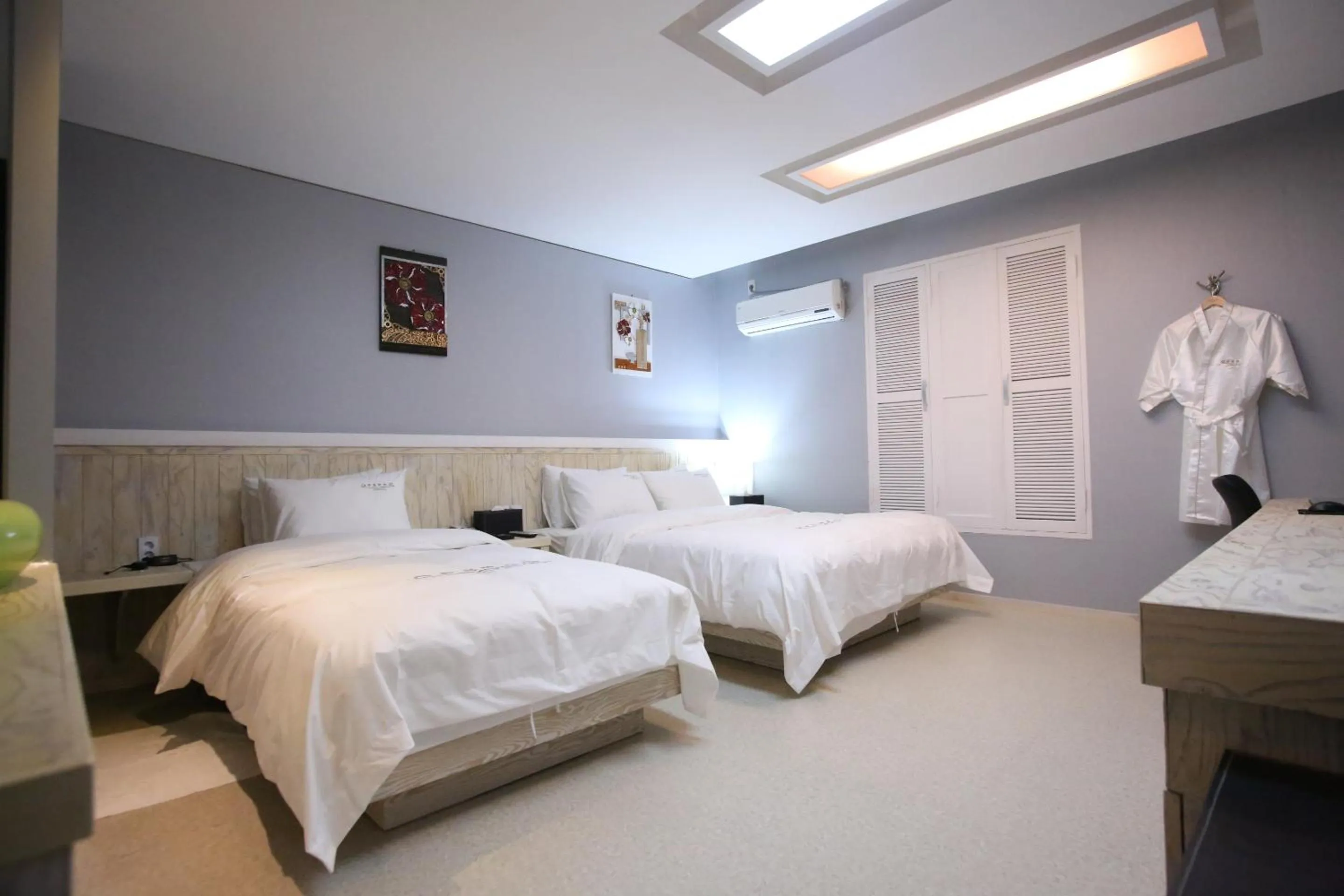 Bed in Opera 21 Hotel