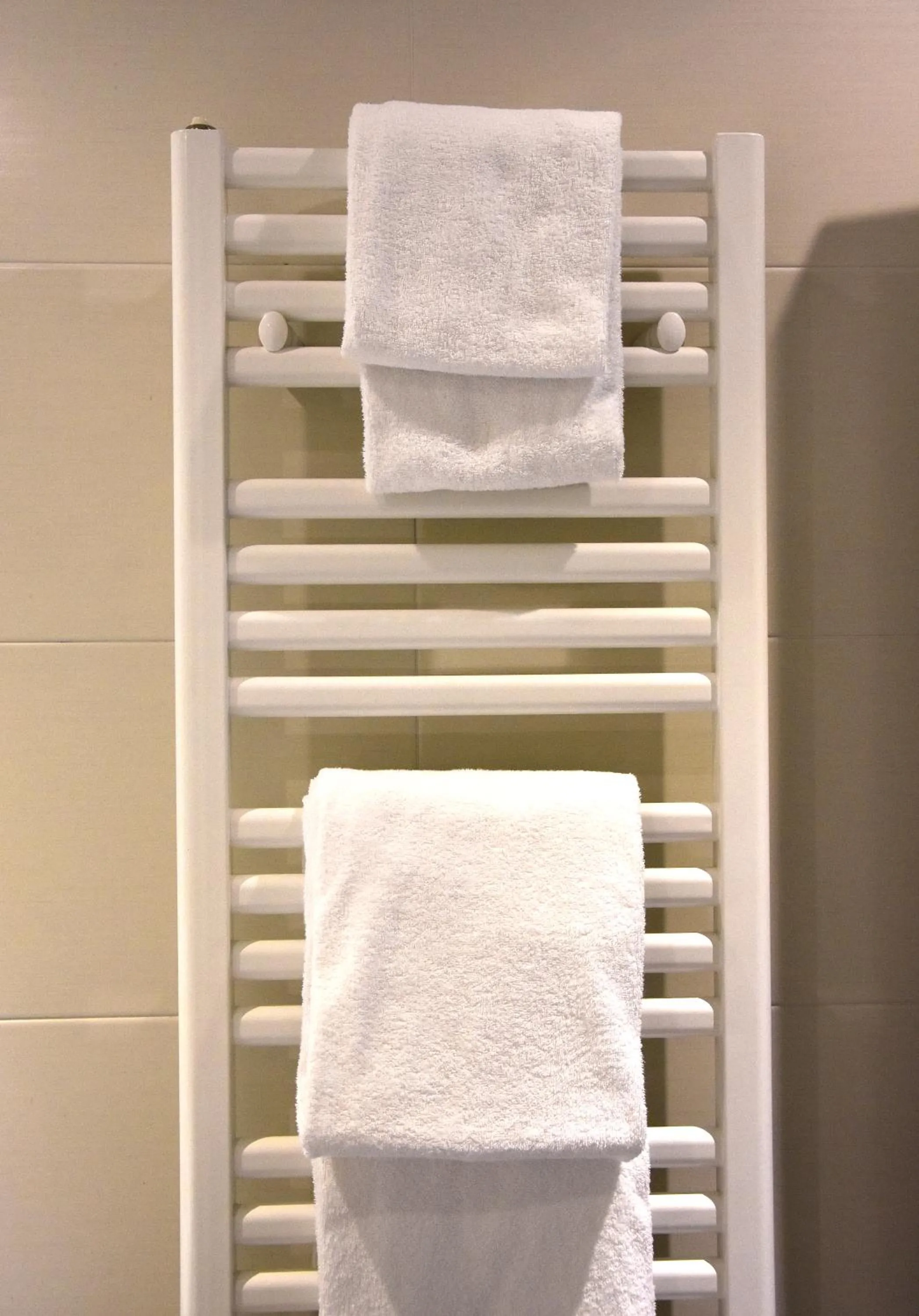 towels in Hotel y Apartamentos SNÖ Isaba