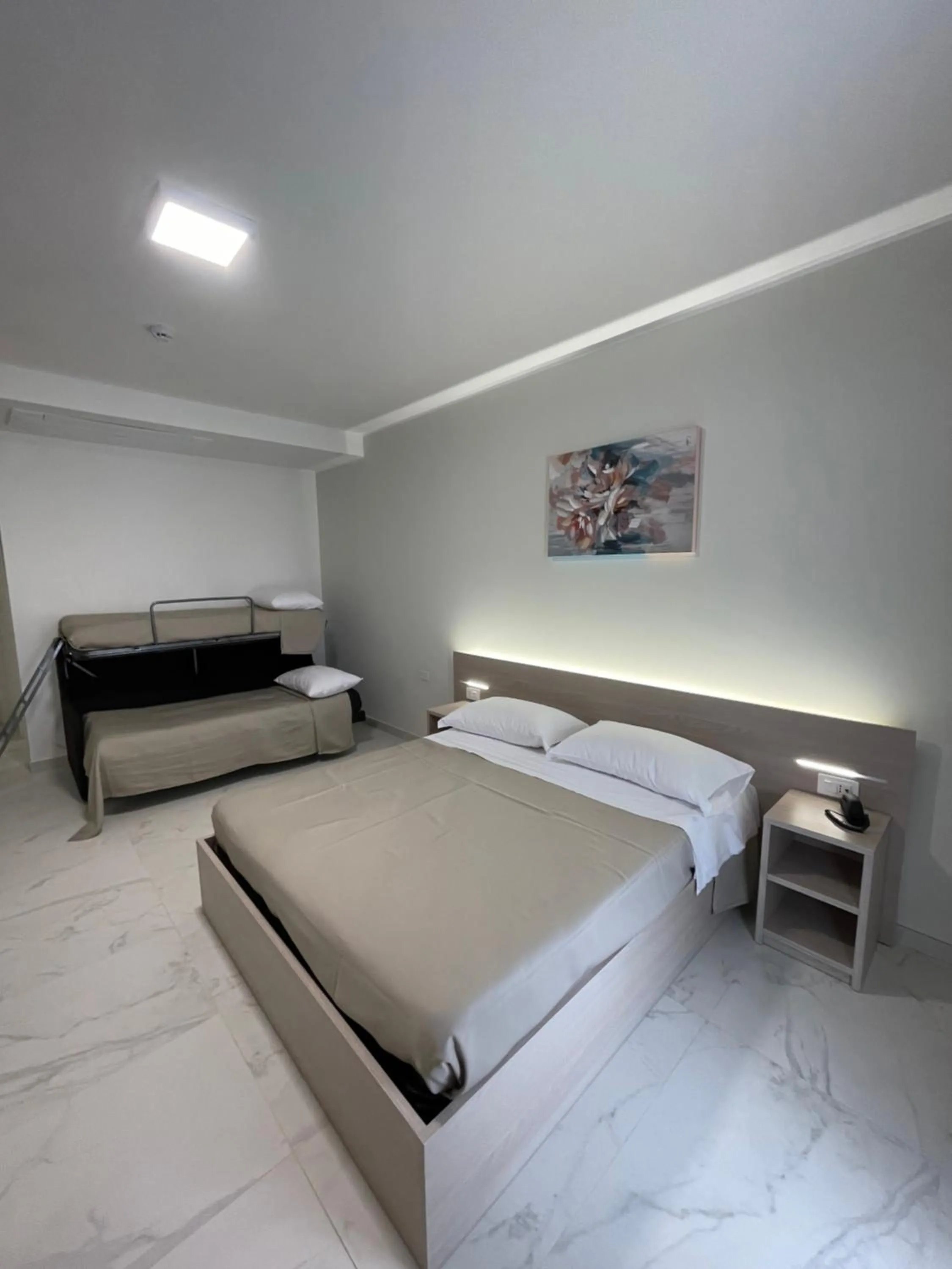 Bed in Hotel Diadema