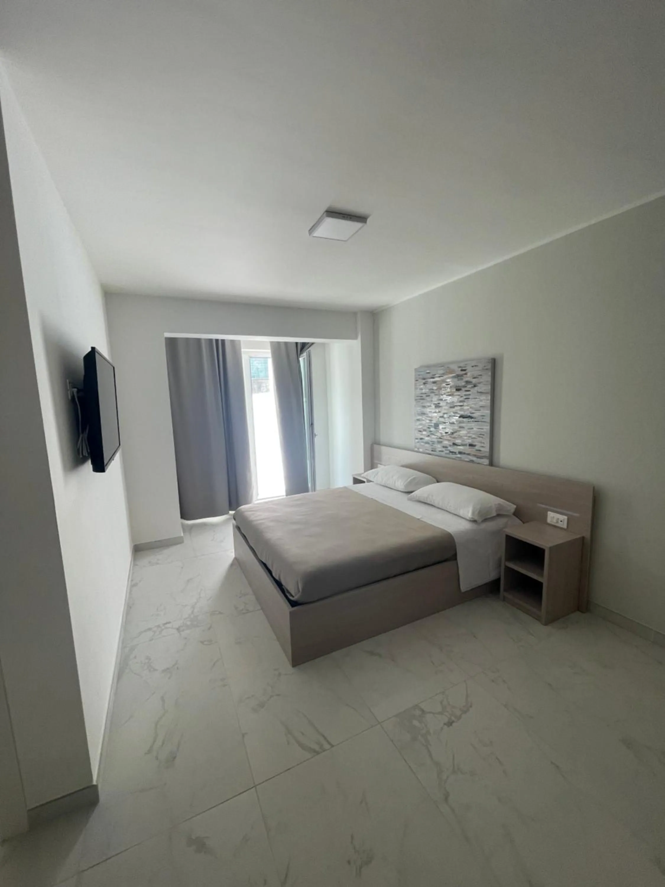 Bed in Hotel Diadema