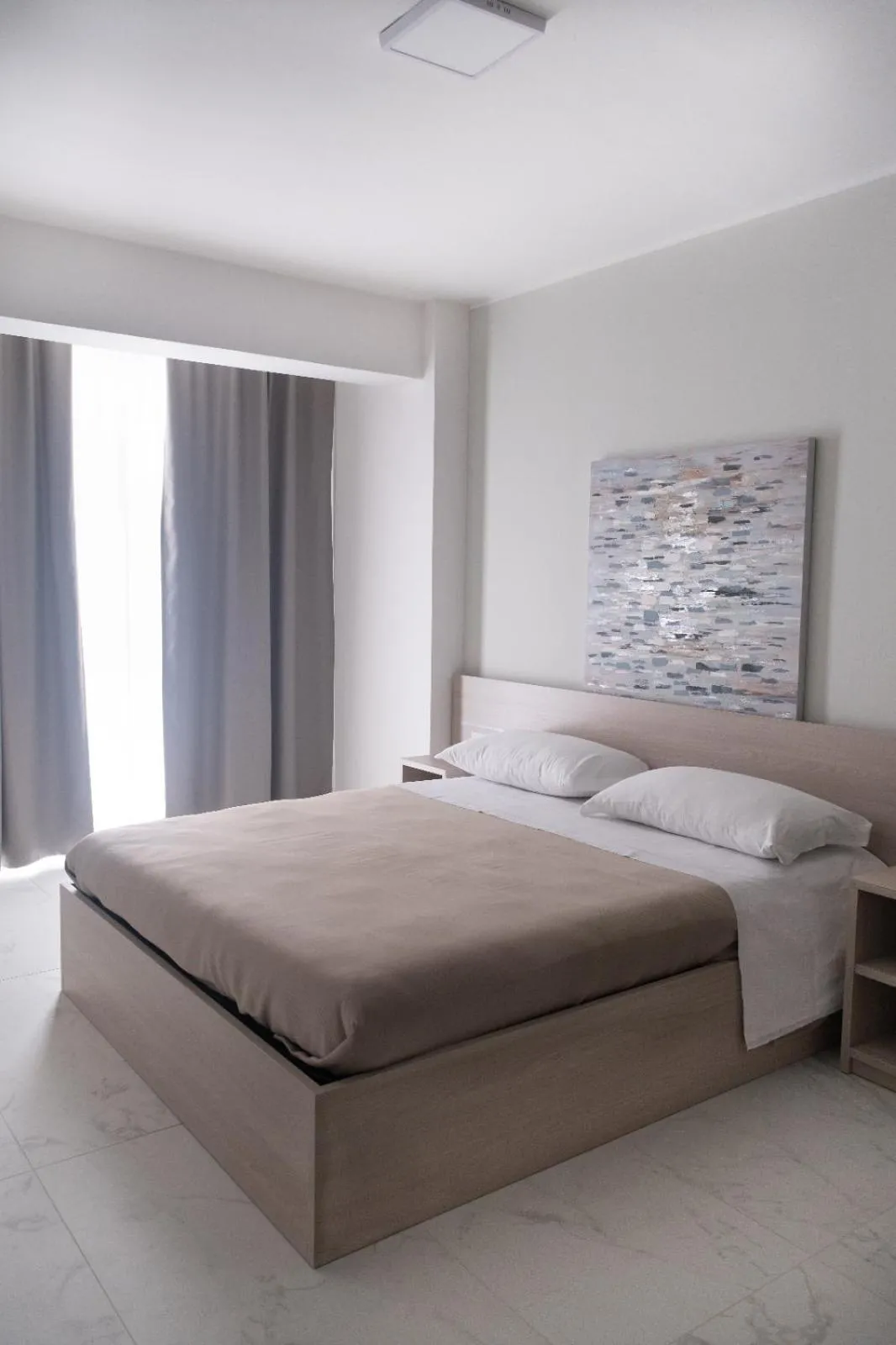 Bed in Hotel Diadema