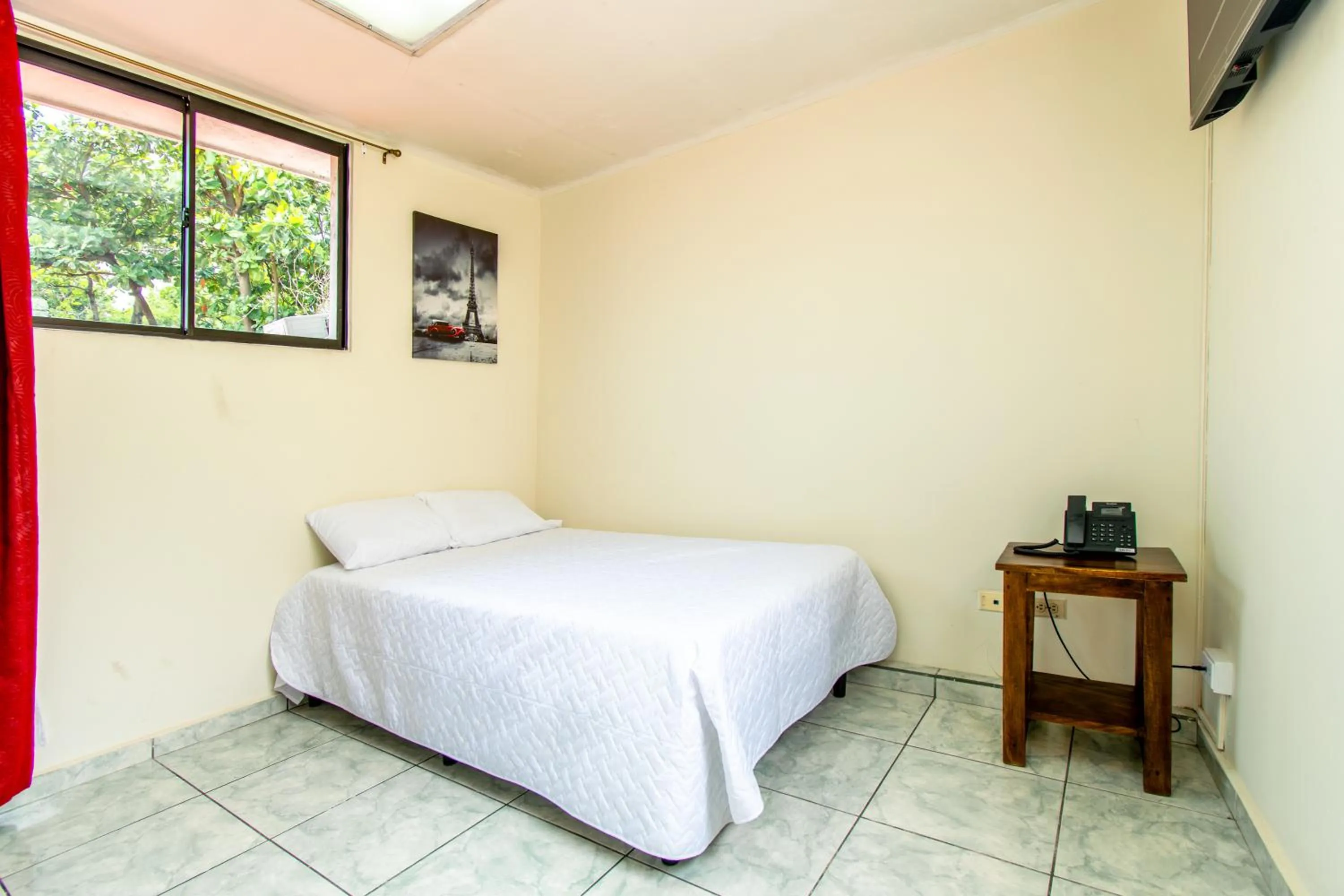 Bed in Lorenzo Hotel