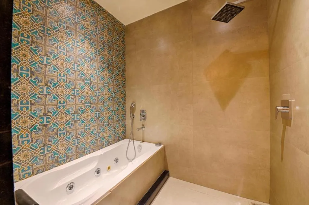 Shower in Gulmohar Mansion - A Boutique Stay