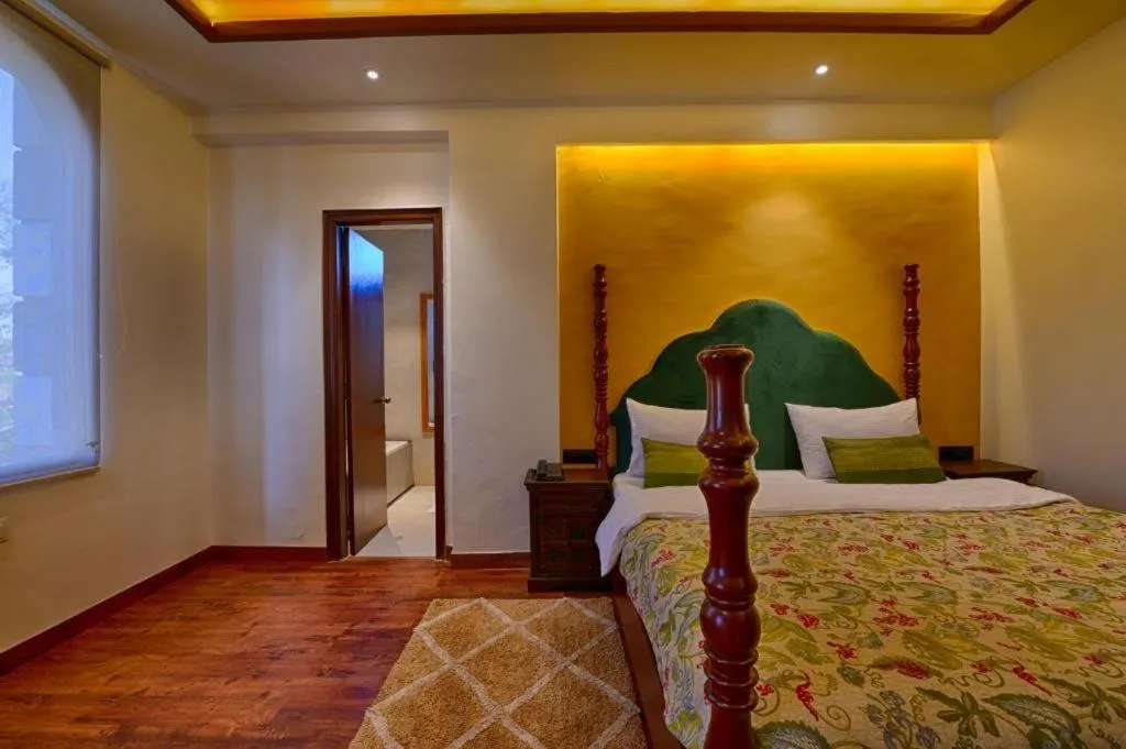 Bed in Gulmohar Mansion - A Boutique Stay