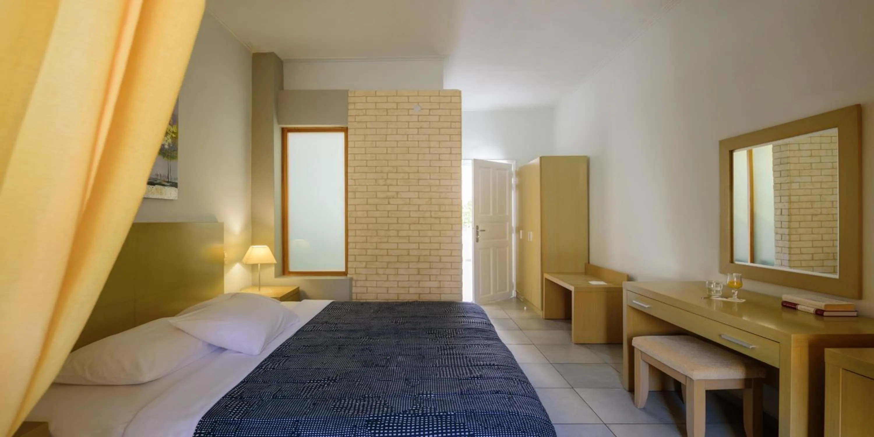 Photo of the whole room, Bed in Afroditi Venus Beach Resort