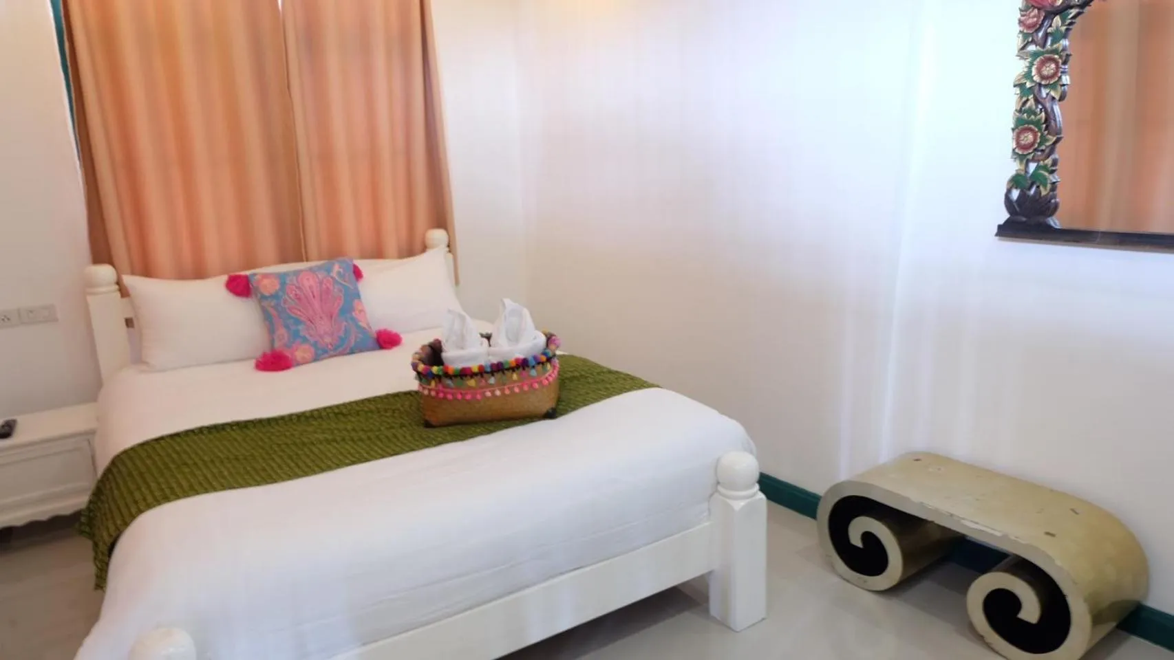 Bed in Yellow Lamoon Hotel