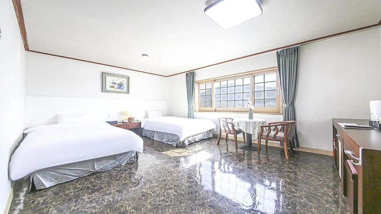 Bed in JeJu Golf Hotel