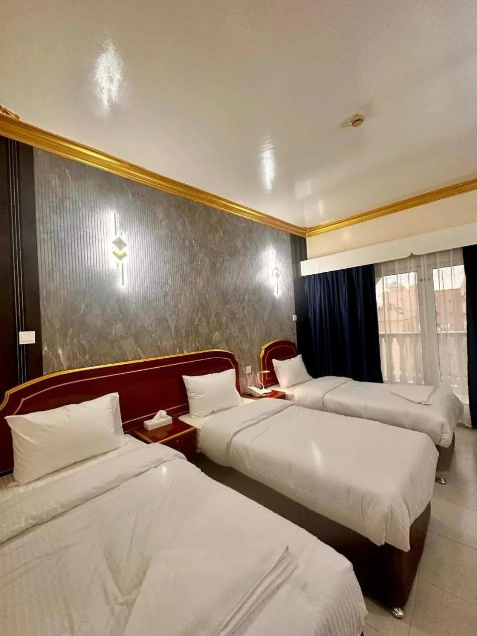 Bed in Galaxy Star Hotel