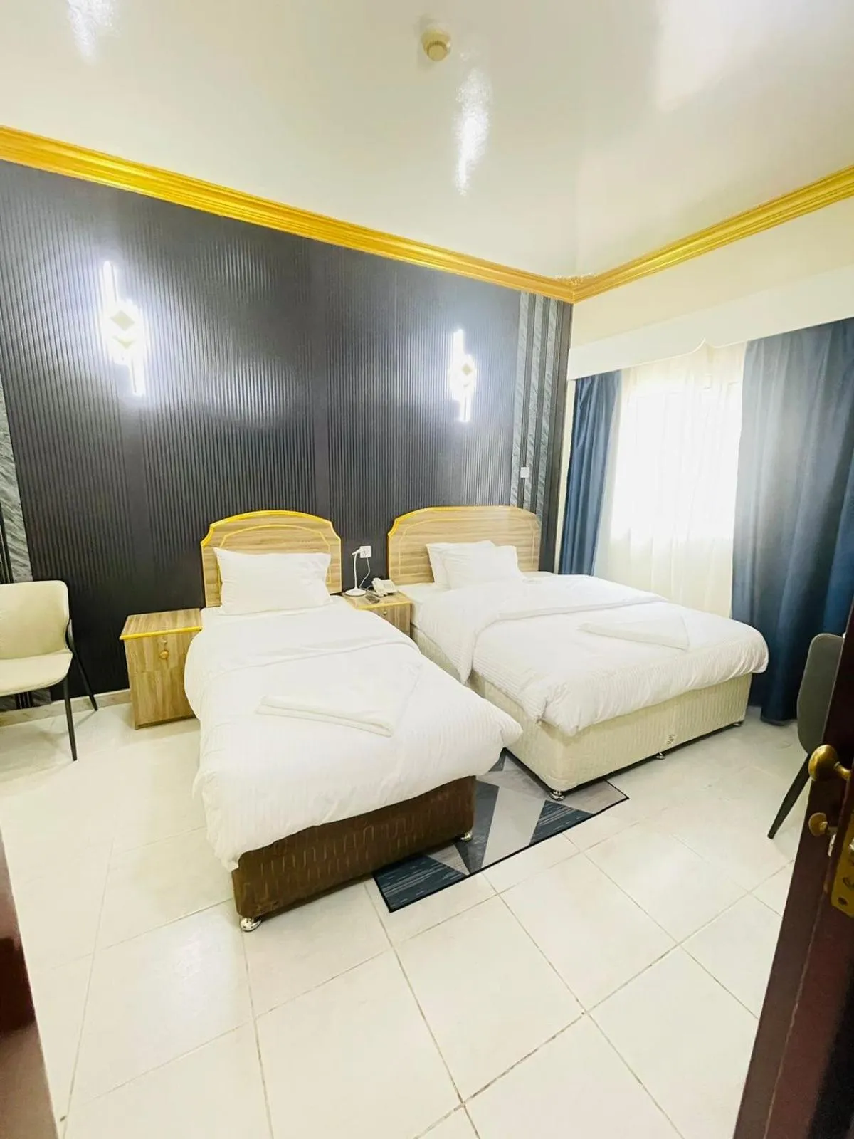 Bed in Galaxy Star Hotel