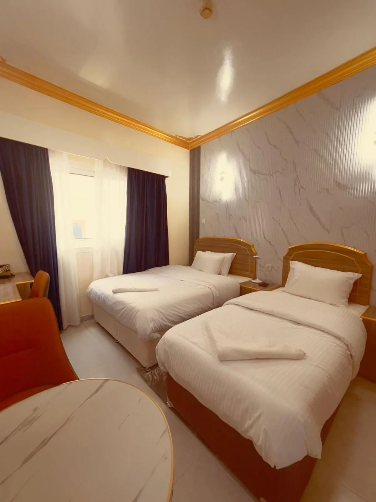 Bed in Galaxy Star Hotel