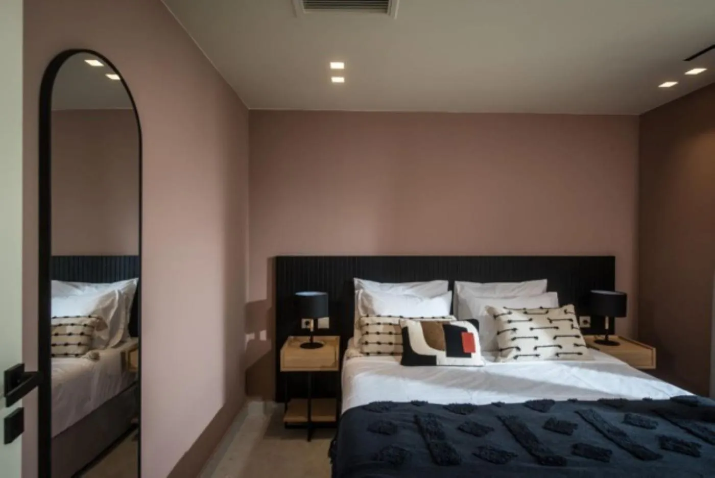 Bed in Centro Vero Suites by Omilos Hotels