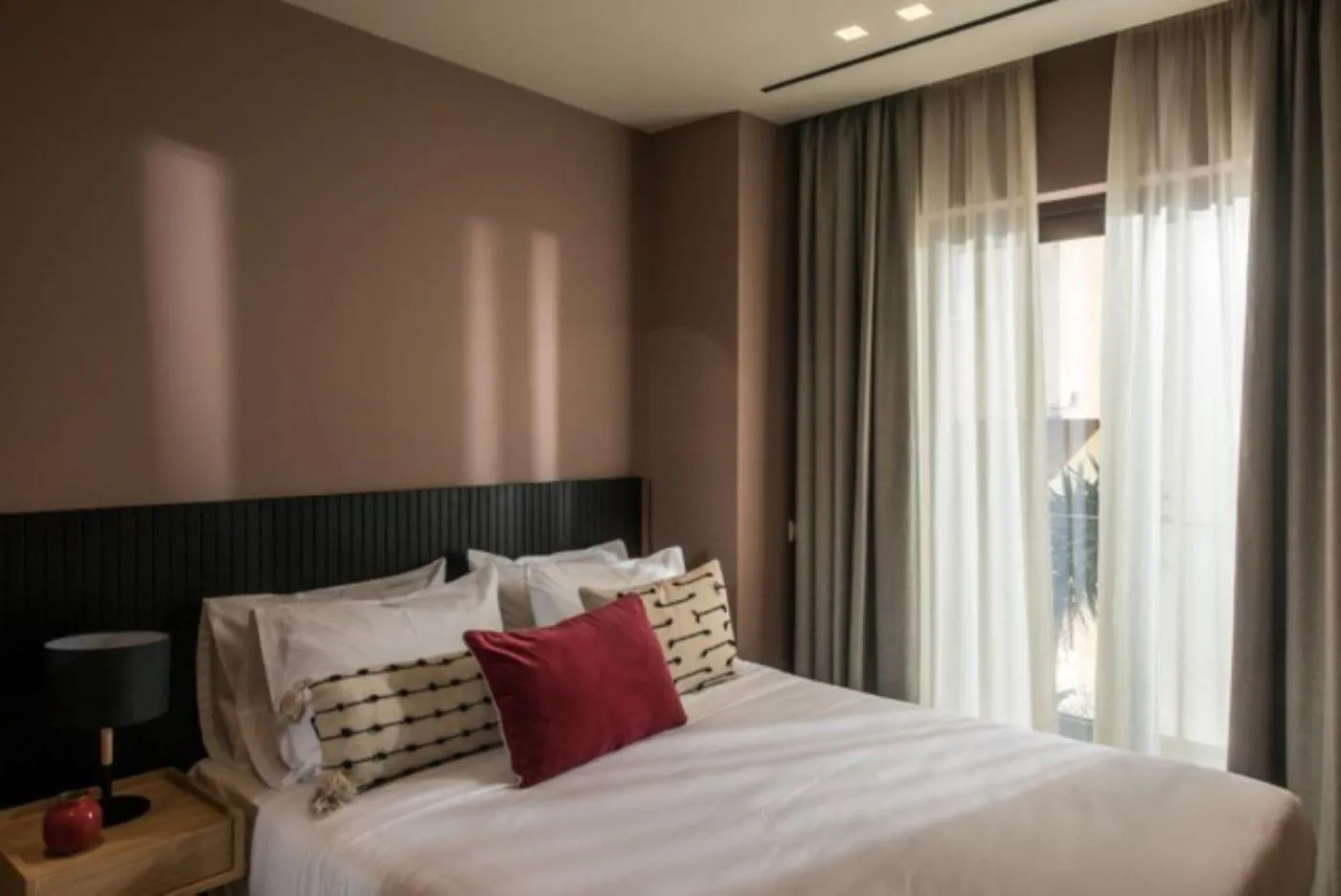 Bed in Centro Vero Suites by Omilos Hotels