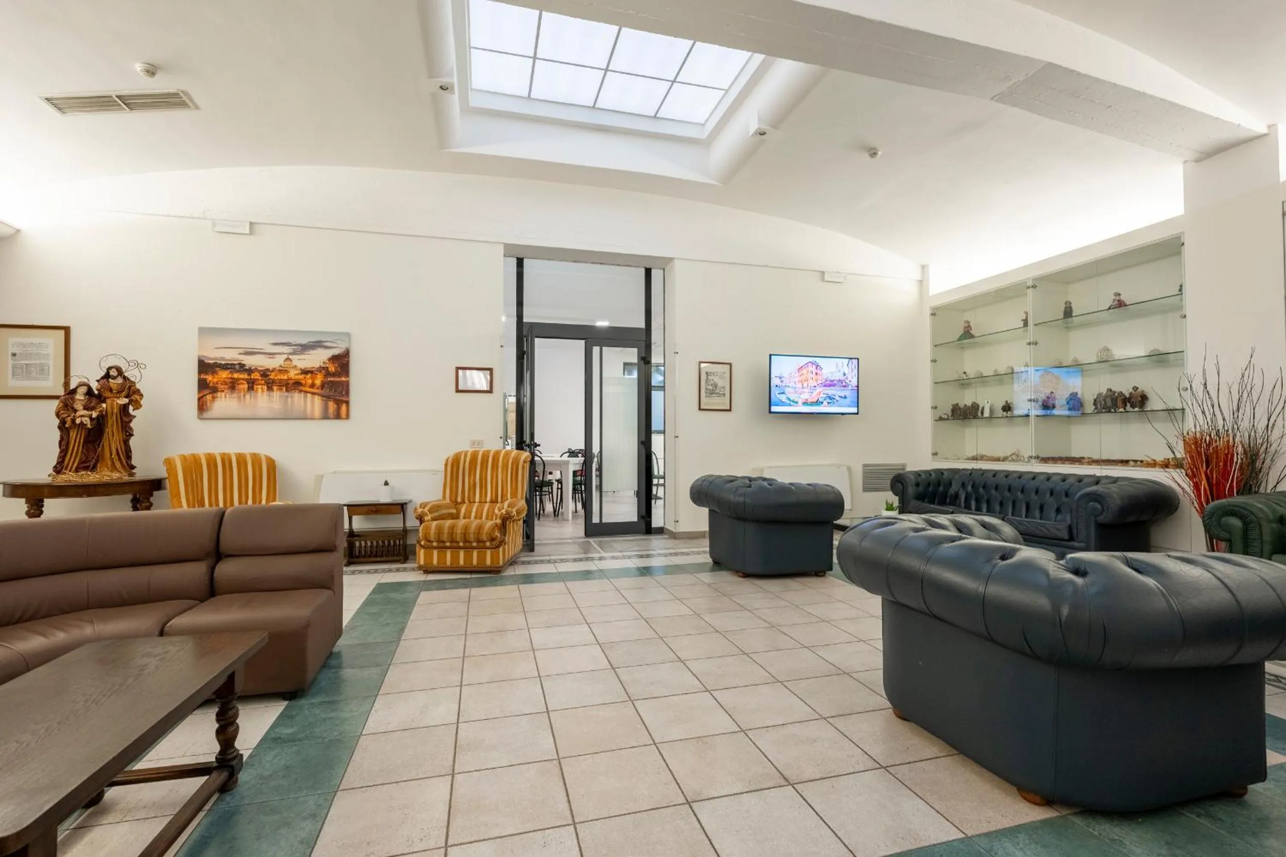 Communal lounge/ TV room in Casa per Ferie Santa Maria alle Fornaci