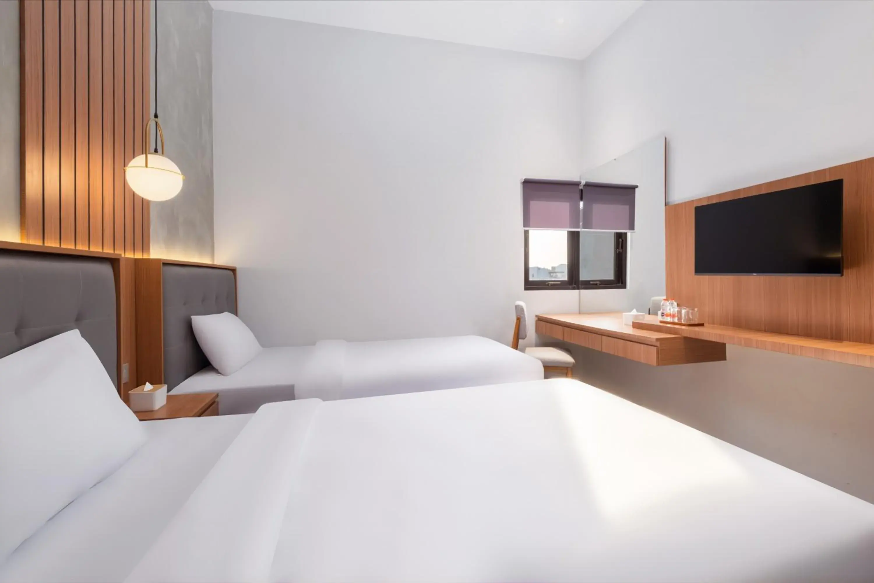 Deluxe Twin Room in Omni Rooms by Sinergi Deluxe Twin Room in Omni Rooms by Sinergi